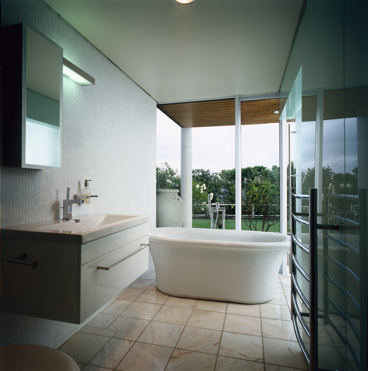 The view of a bathroom featuring a wall architecture, bathroom, daylighting, home, house, interior design, real estate, room, window, gray, black