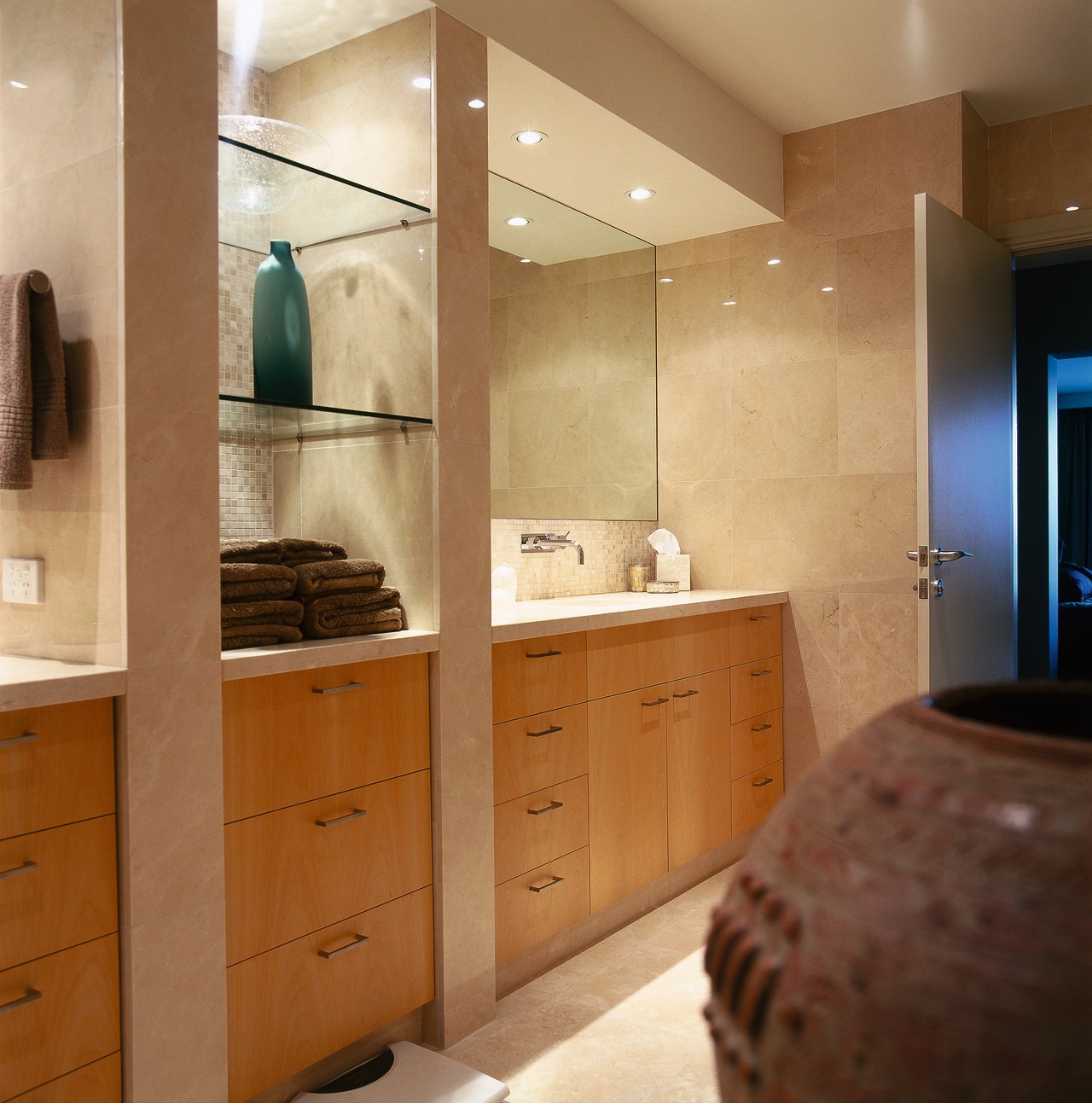 The view of a bathroom showing the lighting bathroom, cabinetry, countertop, interior design, kitchen, room, brown, orange