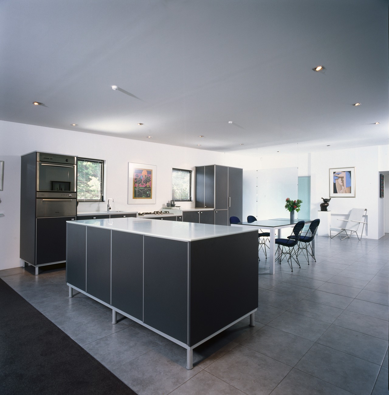 Kitchen with charcoal grey cabinetry and aluminium trim, architecture, ceiling, countertop, daylighting, floor, house, interior design, kitchen, real estate, gray