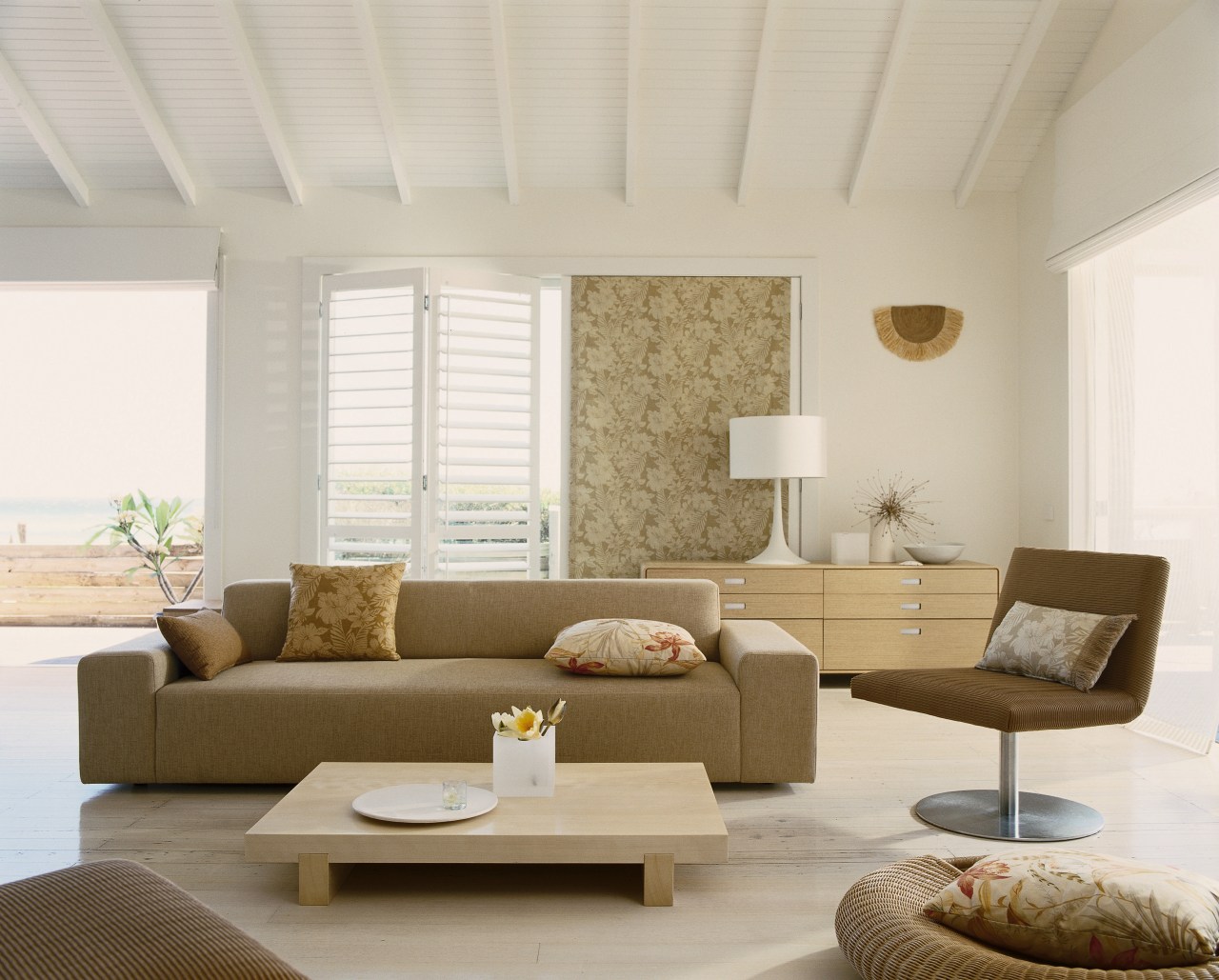 A view of the lounge area with Waikiki ceiling, coffee table, couch, floor, furniture, home, interior design, interior designer, living room, loveseat, room, table, window, gray