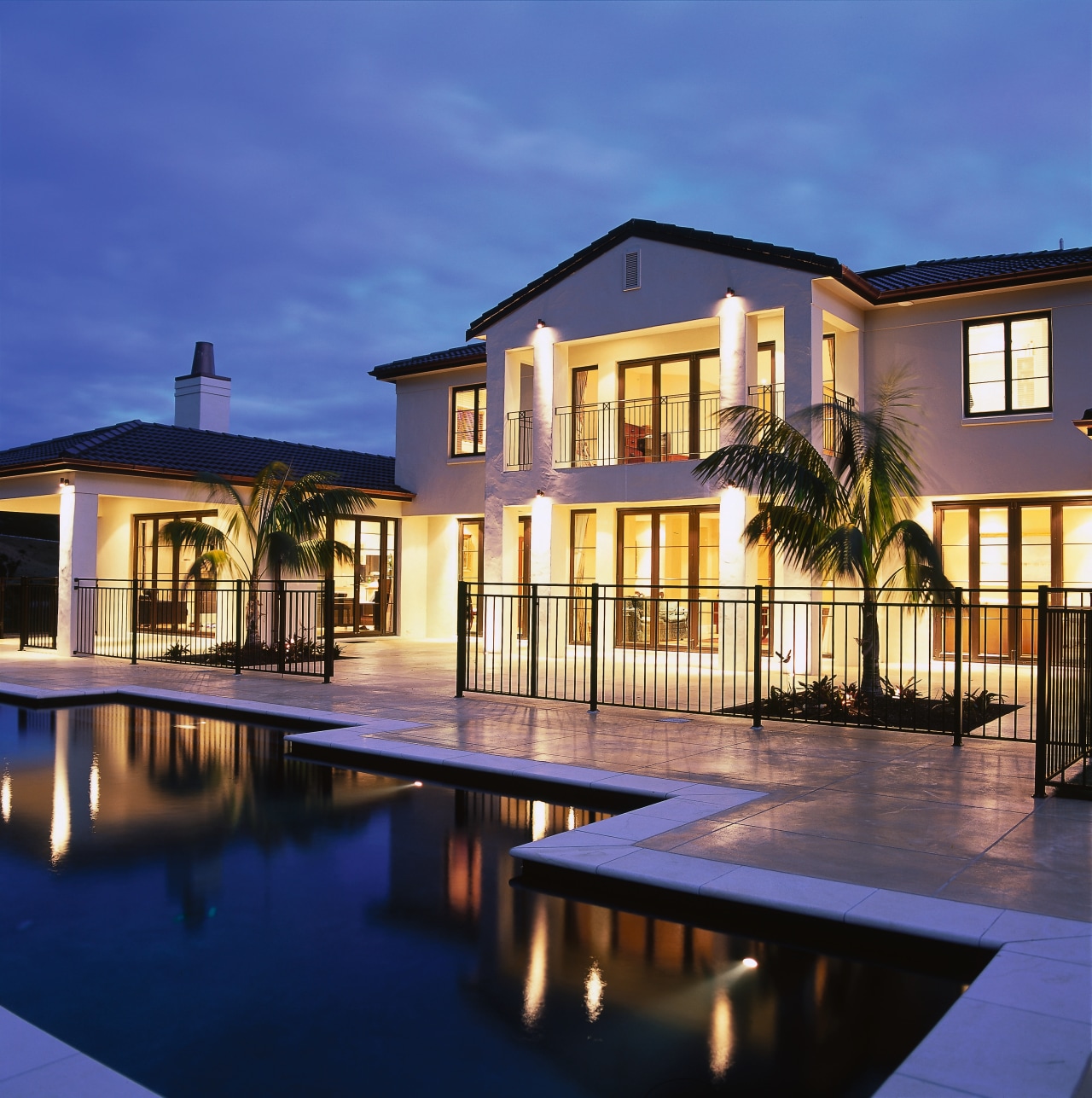 View of the landscaping &amp; design of the apartment, estate, facade, home, house, landscape lighting, lighting, mansion, mixed use, property, real estate, reflection, residential area, resort, sky, swimming pool, villa, window, blue