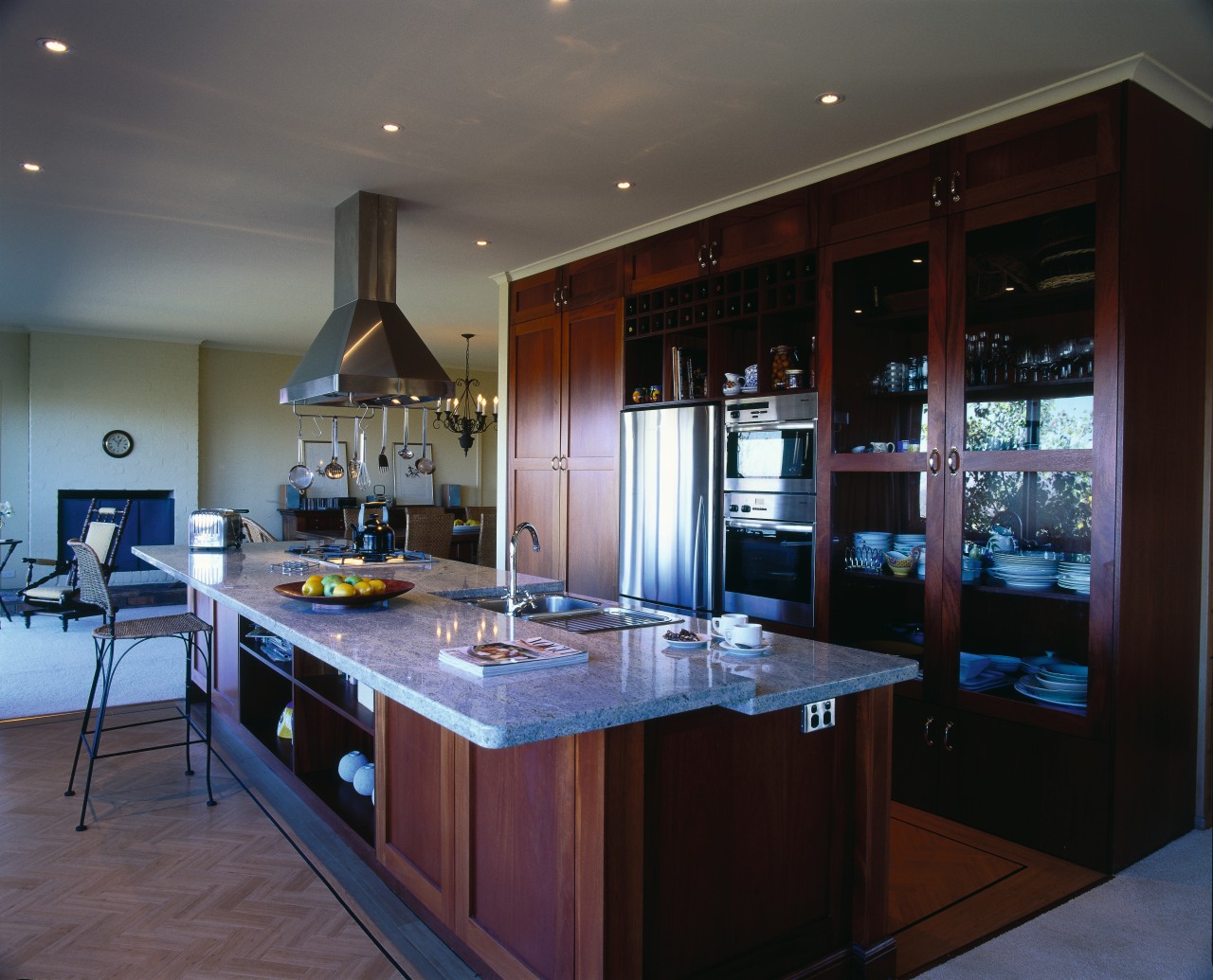 Open plan kitchen with dark timber cabinetry, grey cabinetry, countertop, cuisine classique, interior design, kitchen, room, black, gray