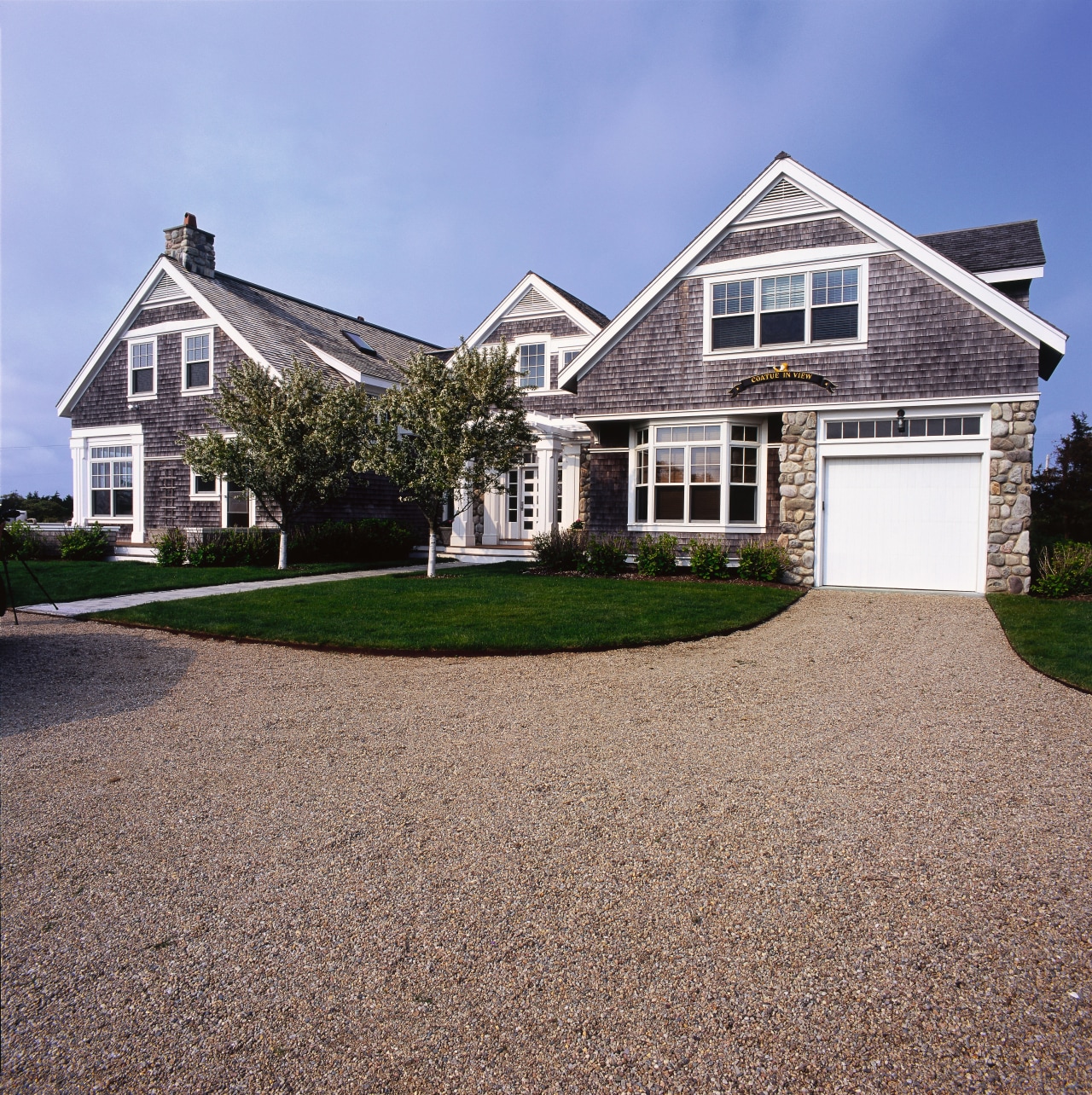 Broad exterior view of this traditional home asphalt, building, cottage, driveway, estate, facade, farmhouse, home, house, land lot, mansion, property, real estate, residential area, siding, sky, suburb, window, teal