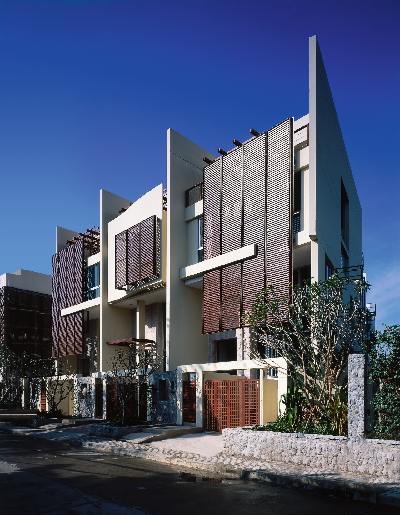 Exterior view of the lofts with timber shade apartment, architecture, building, commercial building, condominium, corporate headquarters, facade, home, house, mixed use, neighbourhood, property, real estate, residential area, sky, blue, black