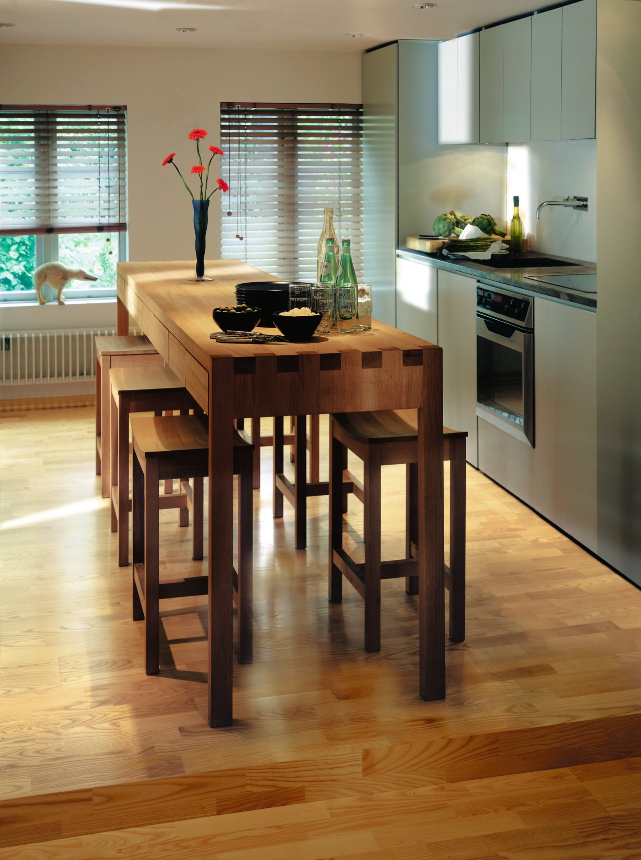 View of the dining &amp; kitchen area countertop, dining room, floor, flooring, furniture, hardwood, interior design, kitchen, laminate flooring, room, table, wood, wood flooring, wood stain, brown