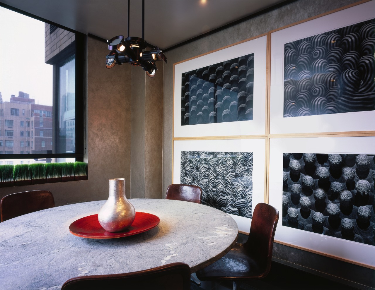 Dining area with round table, and large pictures ceiling, furniture, home, interior design, living room, room, wall, window, black, gray