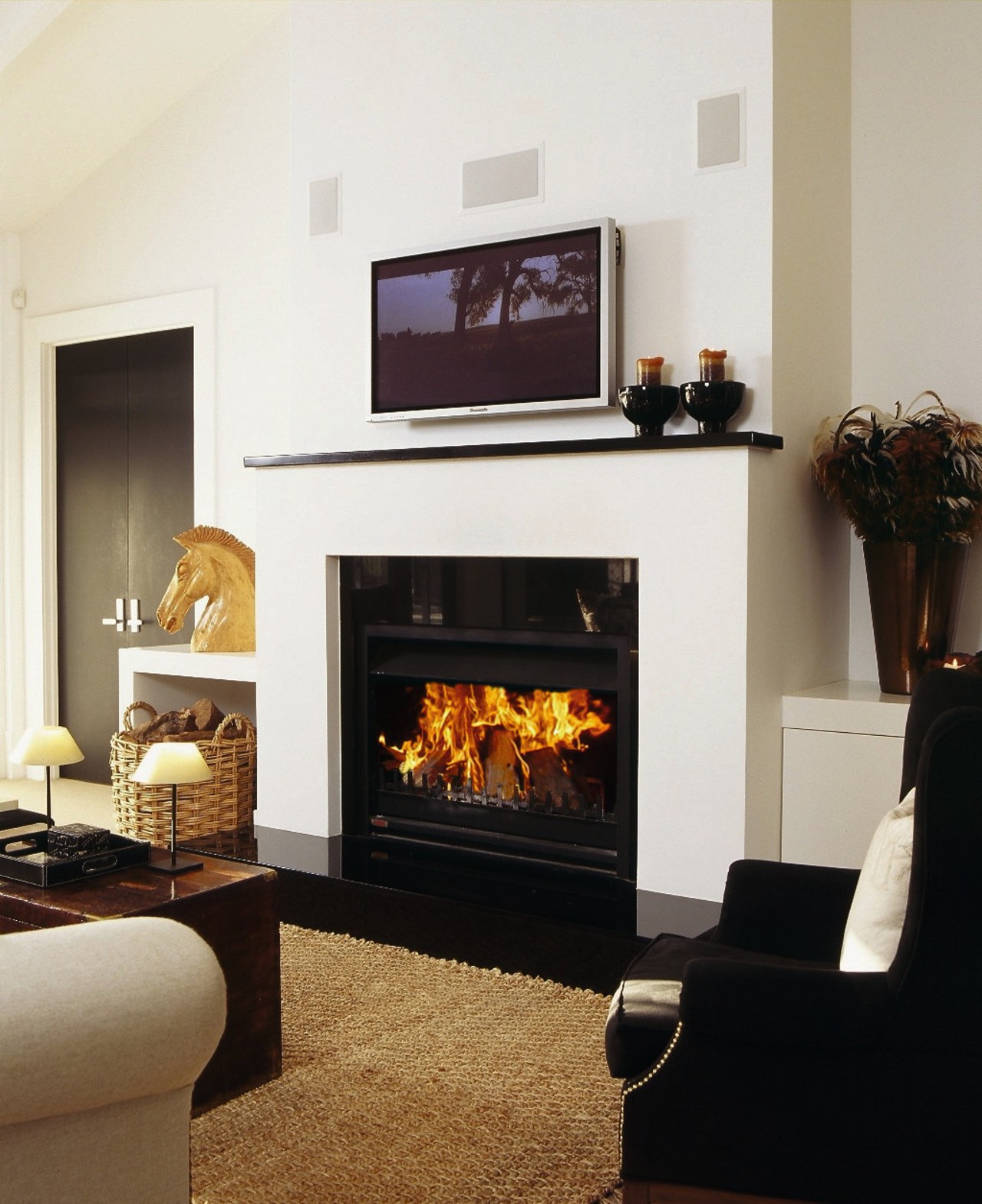 View of the fireplace within this living area fireplace, hearth, heat, home appliance, interior design, living room, wood burning stove, white, black
