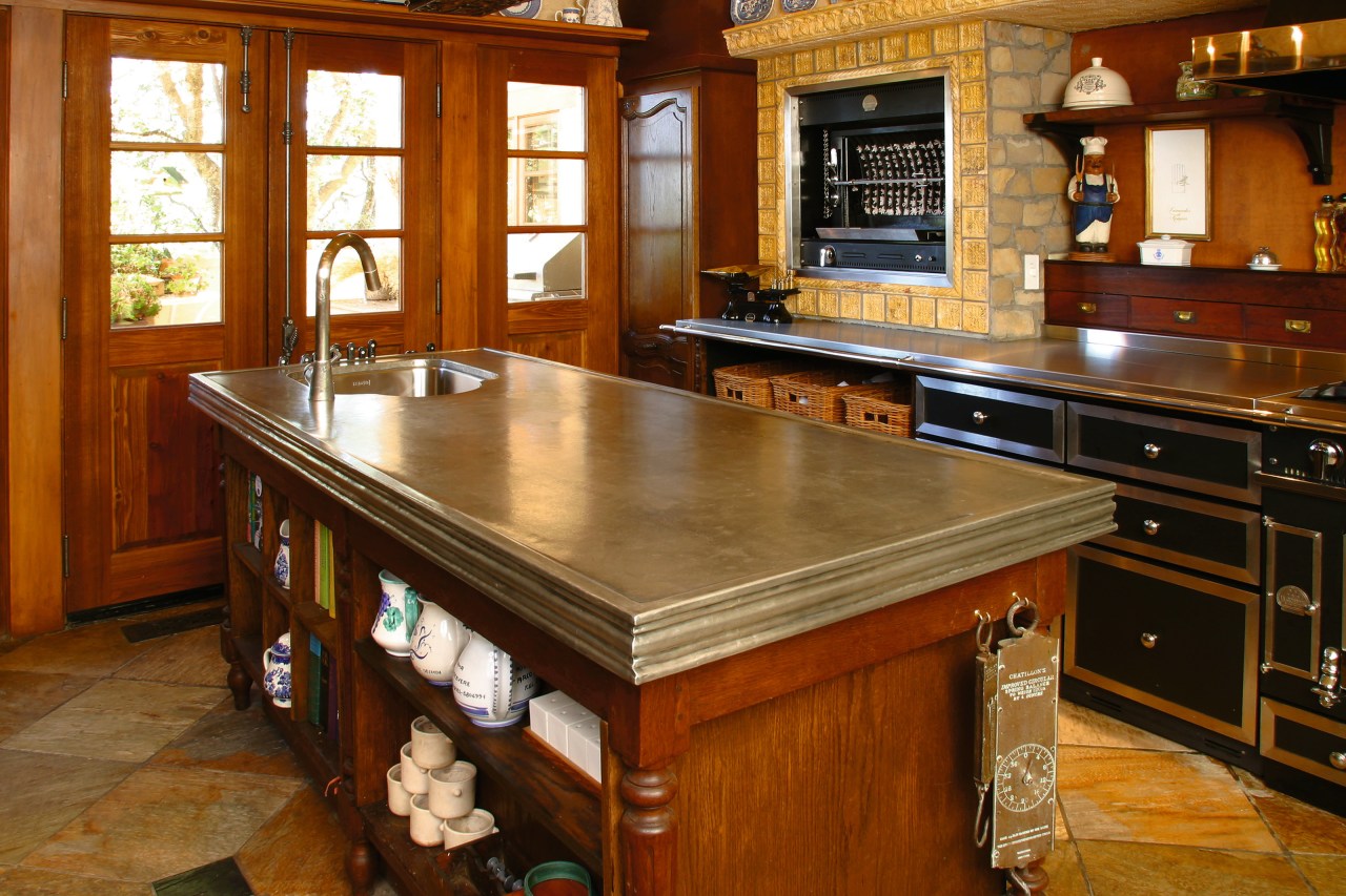 View of this kitchen cabinetry, countertop, cuisine classique, floor, flooring, hardwood, kitchen, room, wood, wood flooring, wood stain, brown