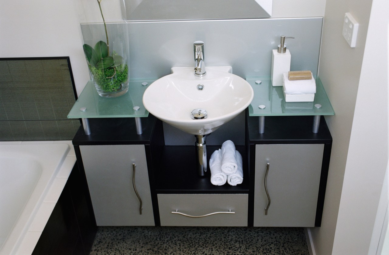 Inner view of the bathroom vanity unit bathroom, bathroom accessory, bathroom cabinet, bathroom sink, ceramic, furniture, plumbing fixture, product design, room, sink, tap, gray, black