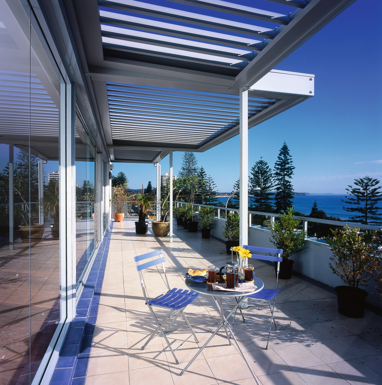 view of the vergola louvres  on this daylighting, outdoor structure, property, real estate, roof, gray