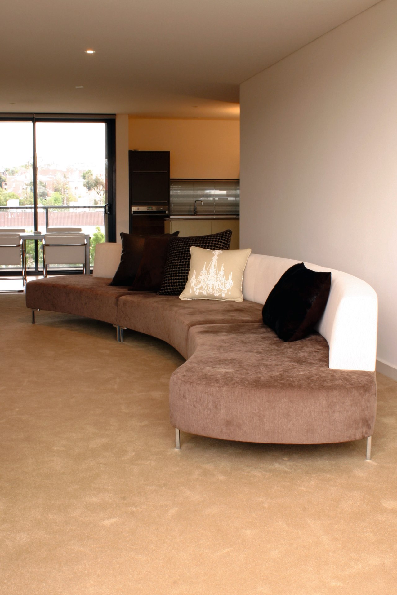 Interior view of sitting area angle, couch, floor, flooring, furniture, hardwood, home, interior design, laminate flooring, living room, room, table, wall, wood, wood flooring, brown, orange