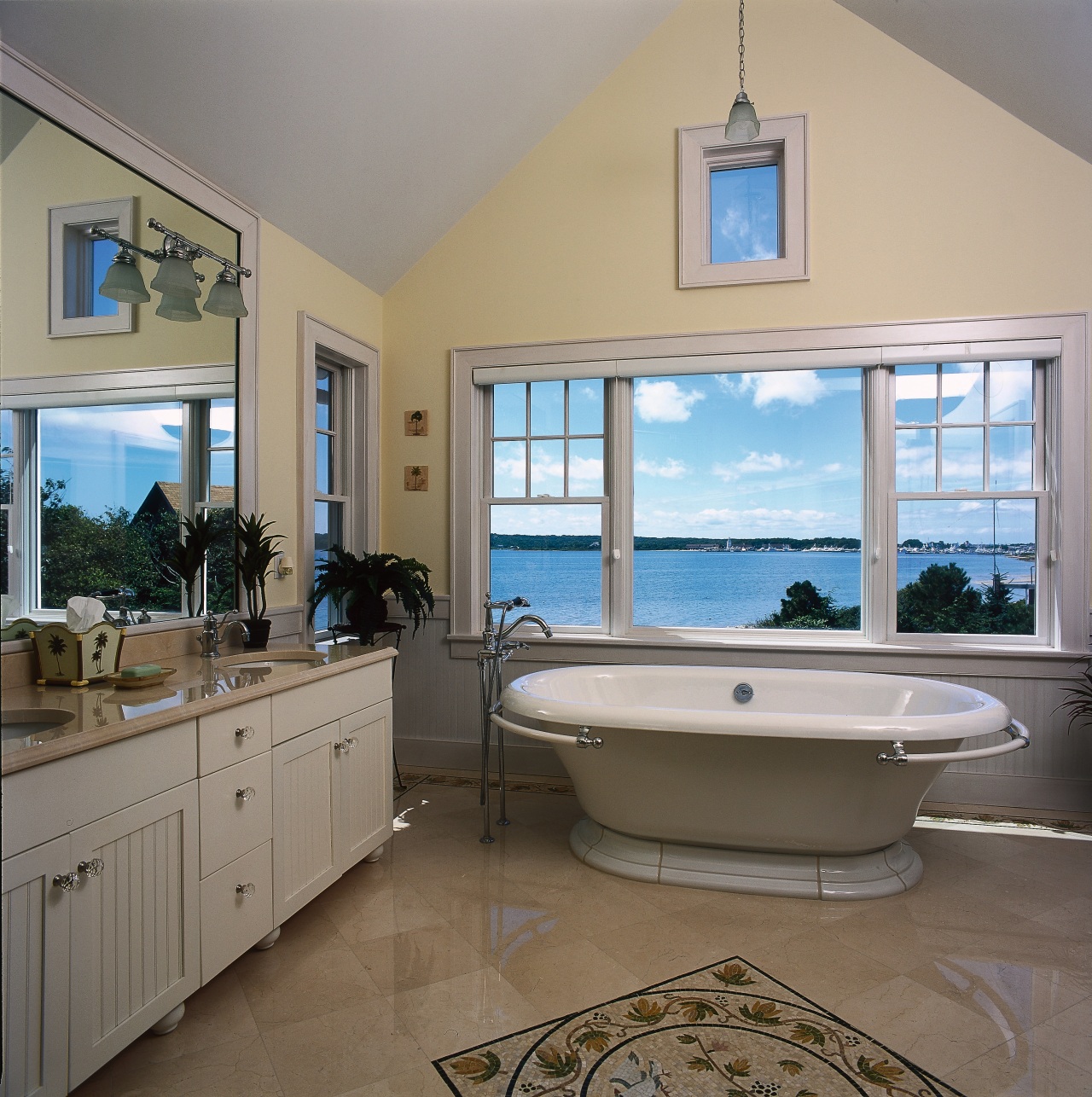 view of this bathroom featuring underfloor heating and bathroom, estate, floor, home, interior design, property, real estate, room, window, gray