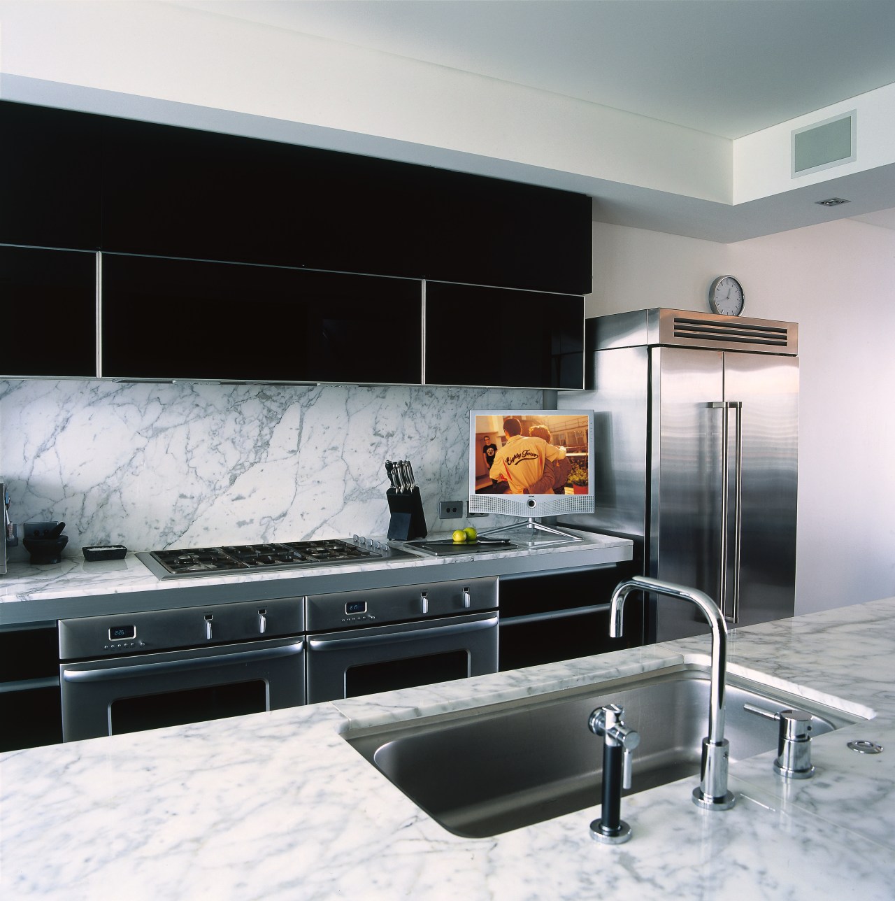 Interior view of kitchen and entertainment, wooden cabinetry, countertop, interior design, kitchen, room, sink, white, black, gray