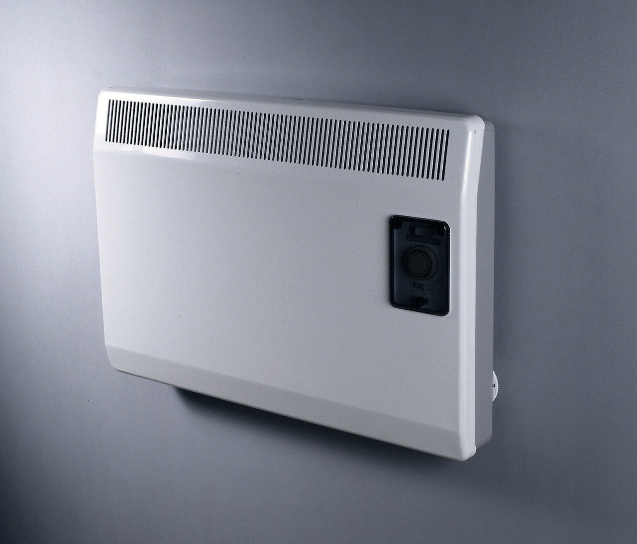 White slimline wall panel heater on grey wall. intercom, product, product design, technology, gray