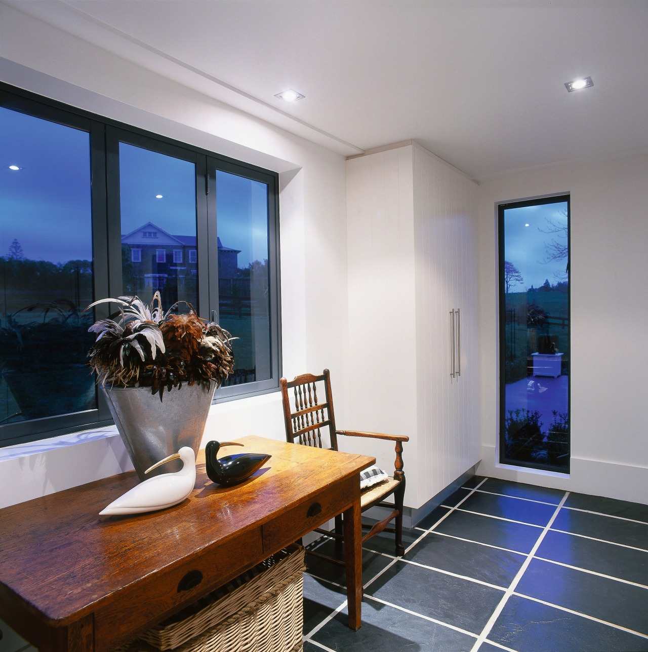 view of the table and chair the provides ceiling, interior design, living room, property, real estate, room, window, gray