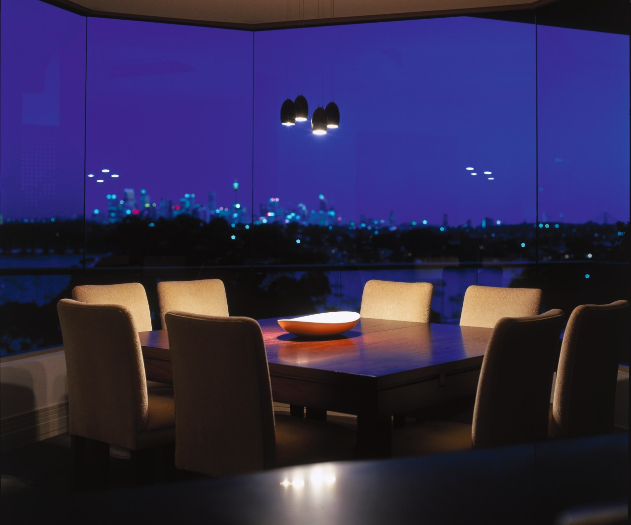 View of this dining area interior design, light, lighting, night, table, black, blue