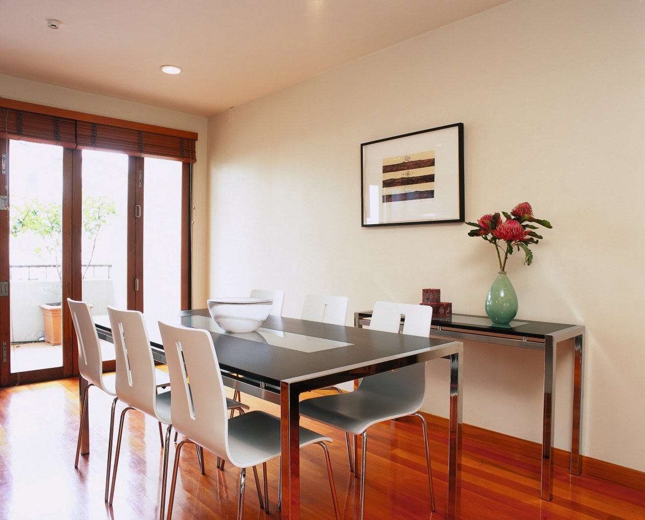 Dining room with long black and chrome table, chair, dining room, floor, furniture, interior design, property, real estate, room, table, gray