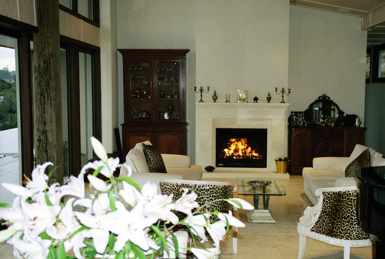 Fireplace in lounge with light coloured surround, cream furniture, hearth, home, interior design, living room, room, brown, black