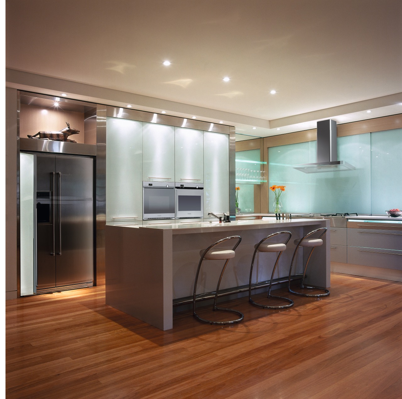 Kitchen with grey cabinetry, frosted glass panels, refrigerator, cabinetry, ceiling, countertop, floor, flooring, hardwood, interior design, kitchen, laminate flooring, wood, wood flooring, brown, gray