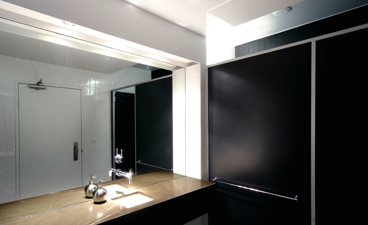 View of the bathroom, mirror, wooden vanity, black architecture, ceiling, glass, interior design, light fixture, lighting, product design, black, gray