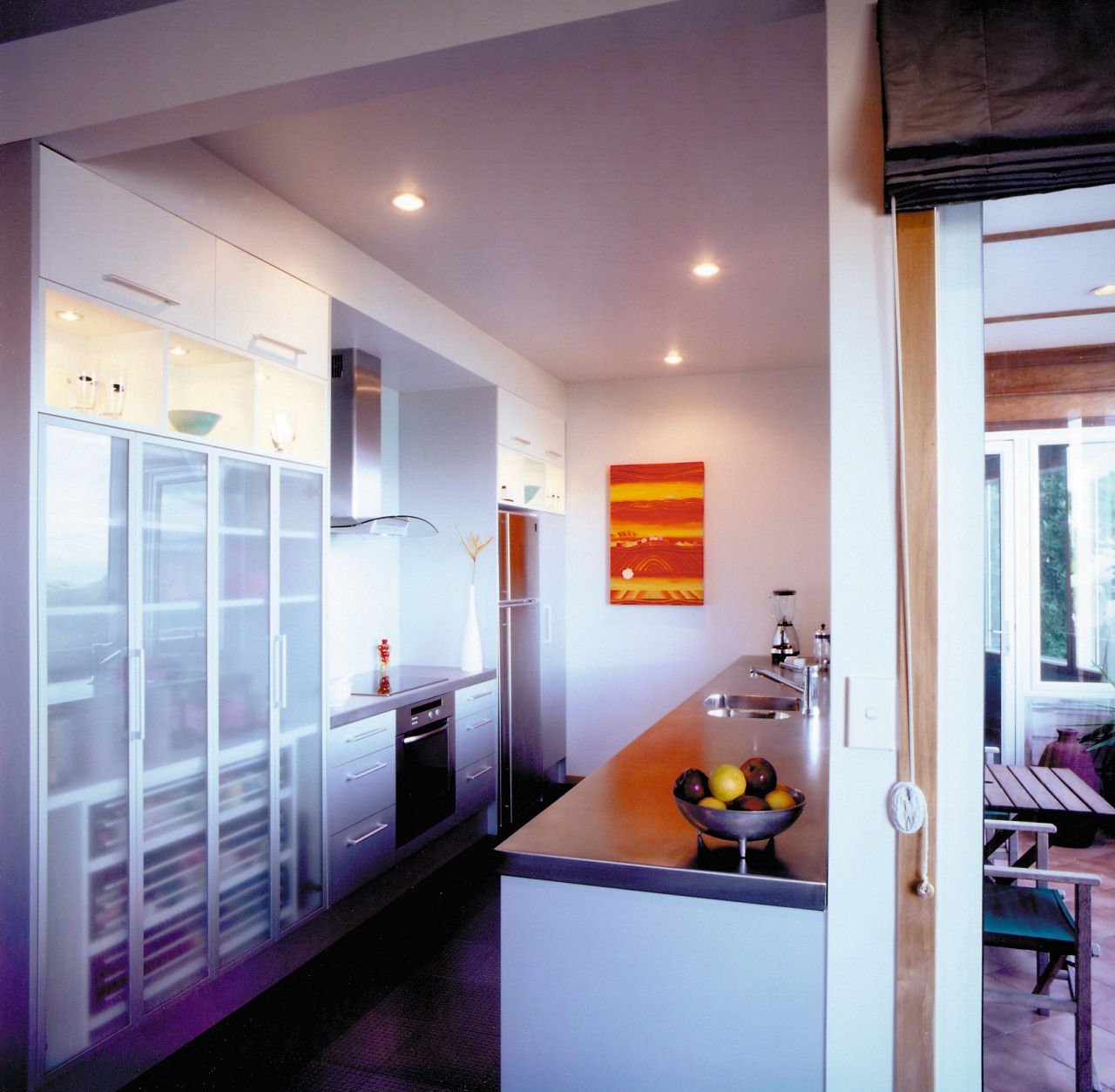 Kitchen with light coloured cabinetry, stainless steel benchtop, ceiling, door, house, interior design, kitchen, real estate, room, window