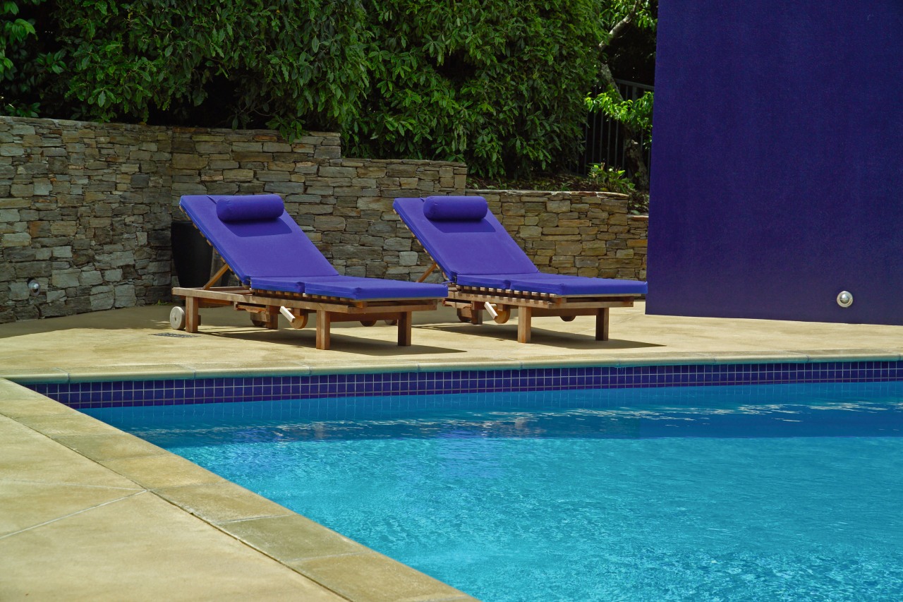 Pool with coloured concrete used as surround, blue leisure, outdoor furniture, property, sunlounger, swimming pool, water