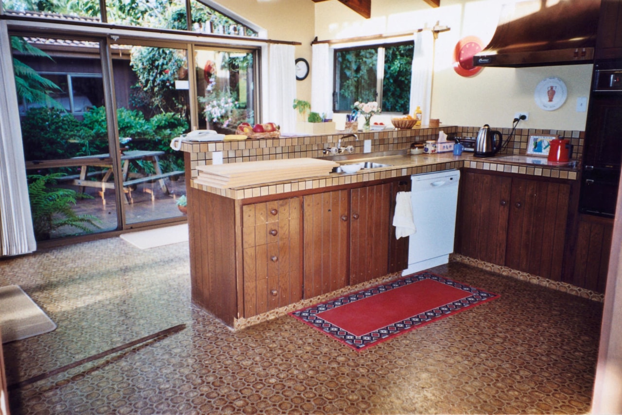 Kitchen before renovation with timber cabinetry, lino floor, countertop, floor, flooring, hardwood, kitchen, property, real estate, room, wood, gray