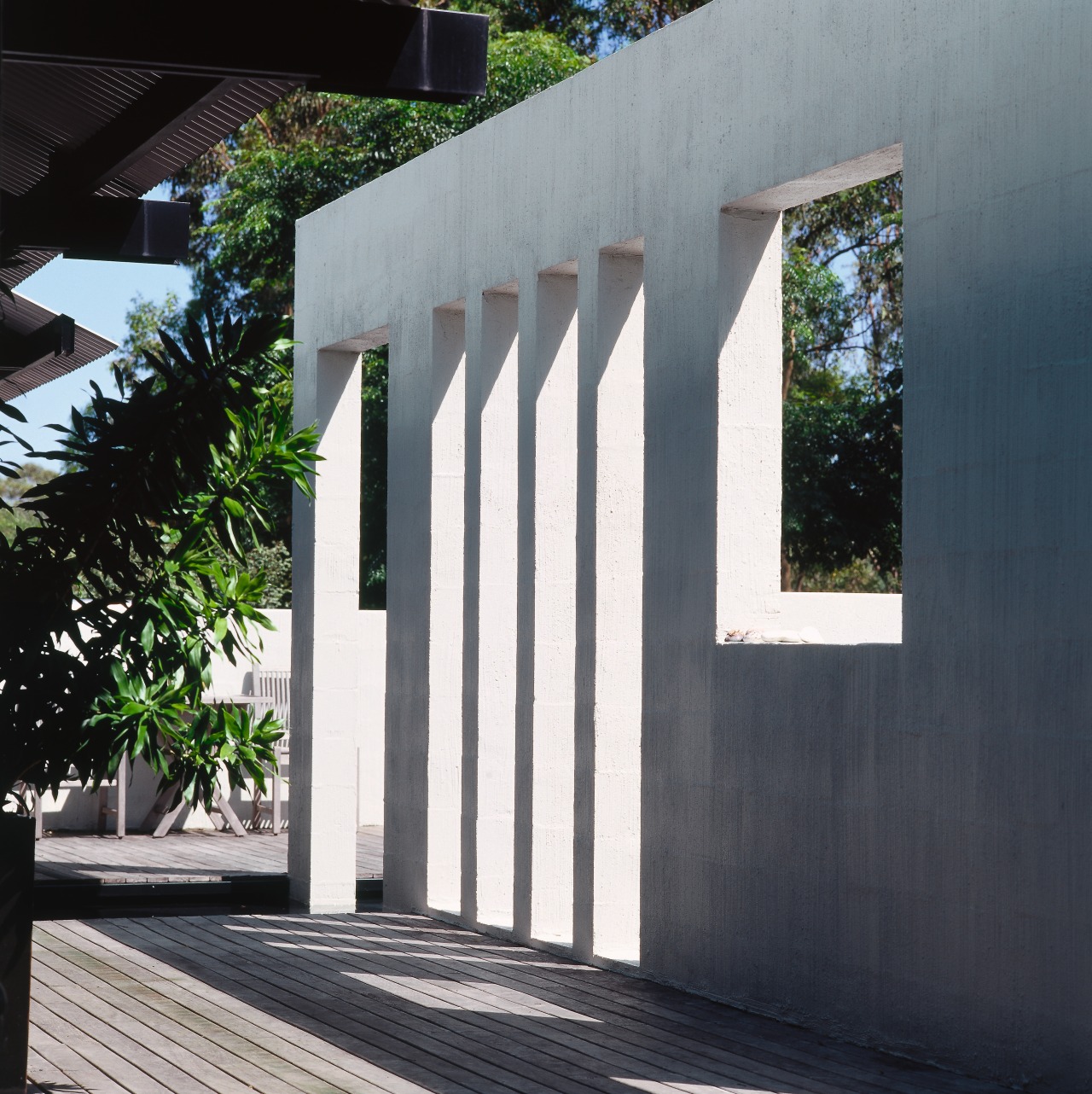 View of a large concrete wall with one architecture, facade, house, structure, black, gray