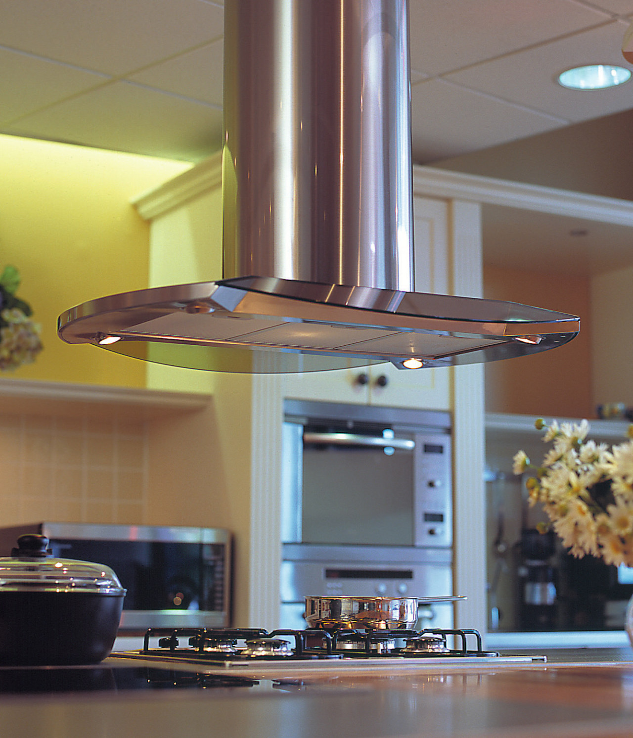 Kitchen with stainless steel and glass canopy over ceiling, countertop, home appliance, interior design, kitchen, light fixture, gray, brown