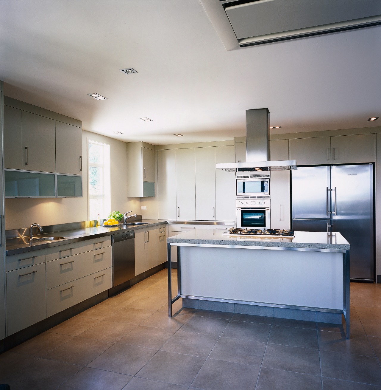 Kitchen with light coloured cabinetry, aluminium frames, island cabinetry, ceiling, countertop, floor, interior design, kitchen, real estate, room, gray