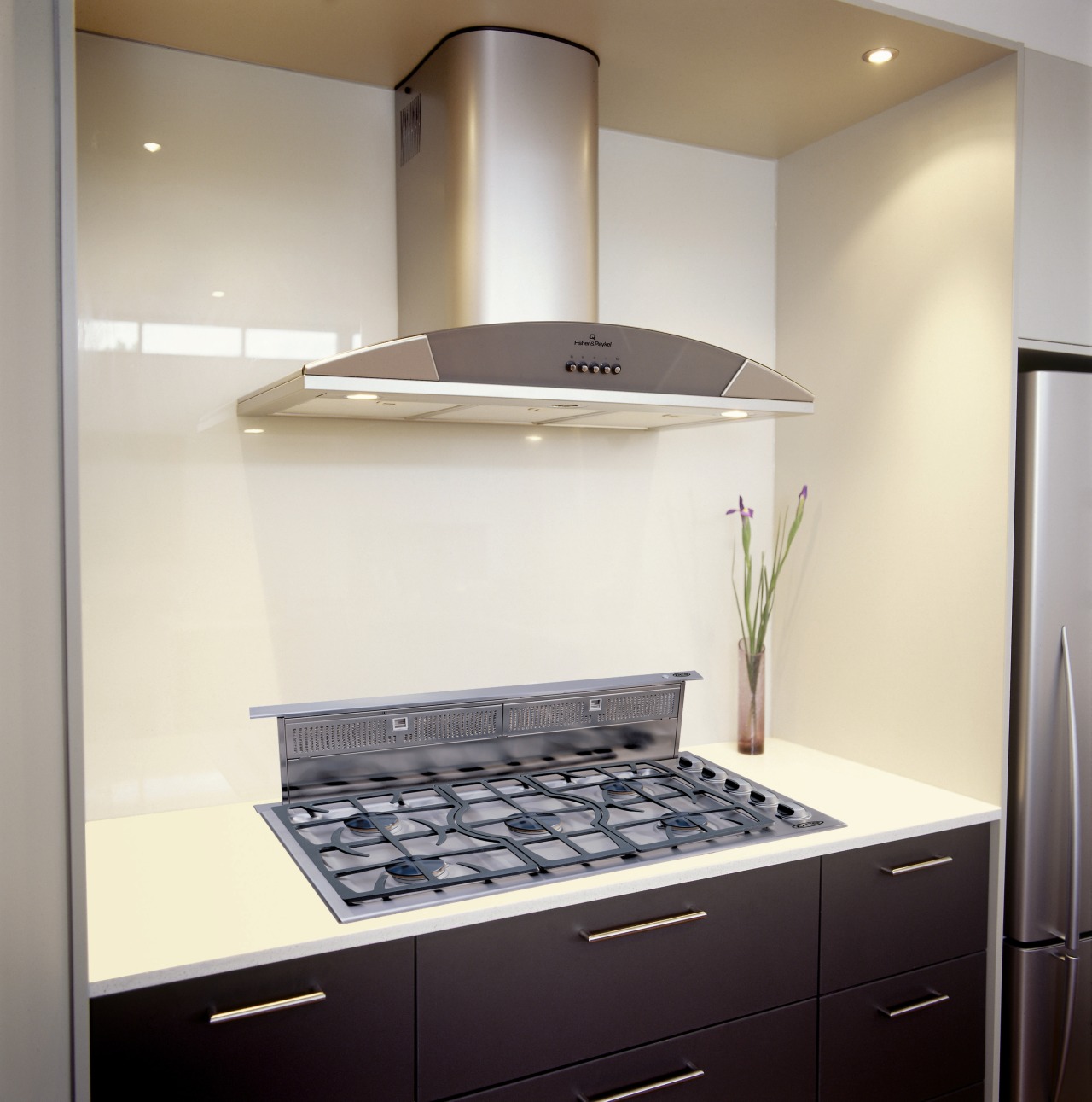 View of a kitchen, stainless steel rangehood and cabinetry, countertop, home appliance, interior design, kitchen, product design, room, white