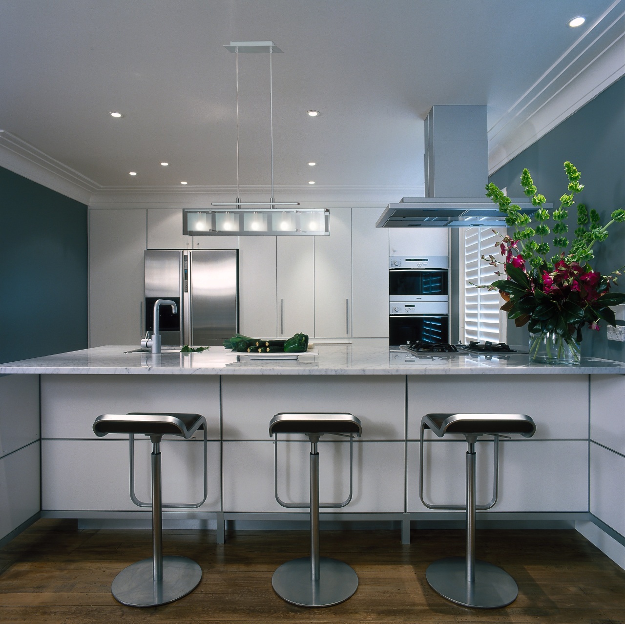 Kitchen with light grey coloured cabinetry and benchtops, cabinetry, countertop, interior design, kitchen, product design, gray