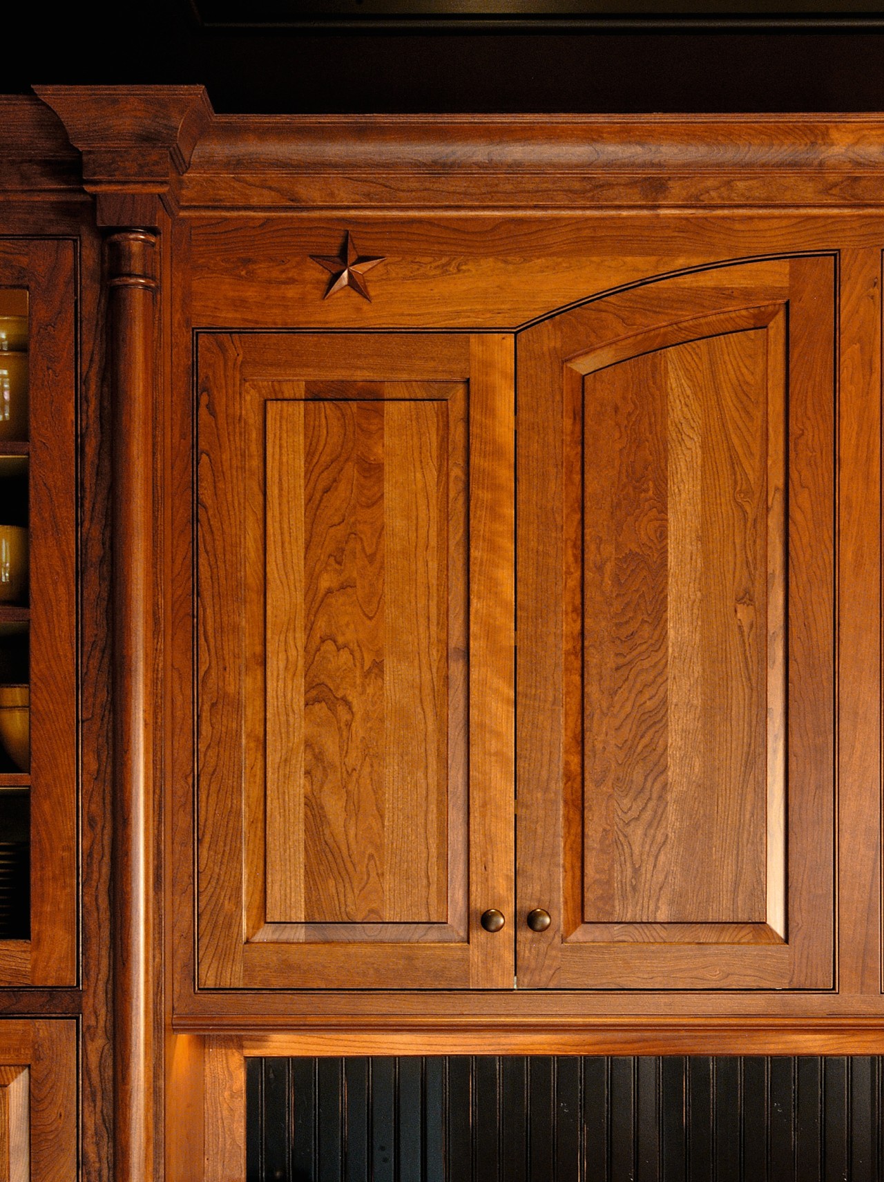 Close up view of some wooden cabinetry. cabinetry, cupboard, door, furniture, hardwood, wood, wood stain, brown