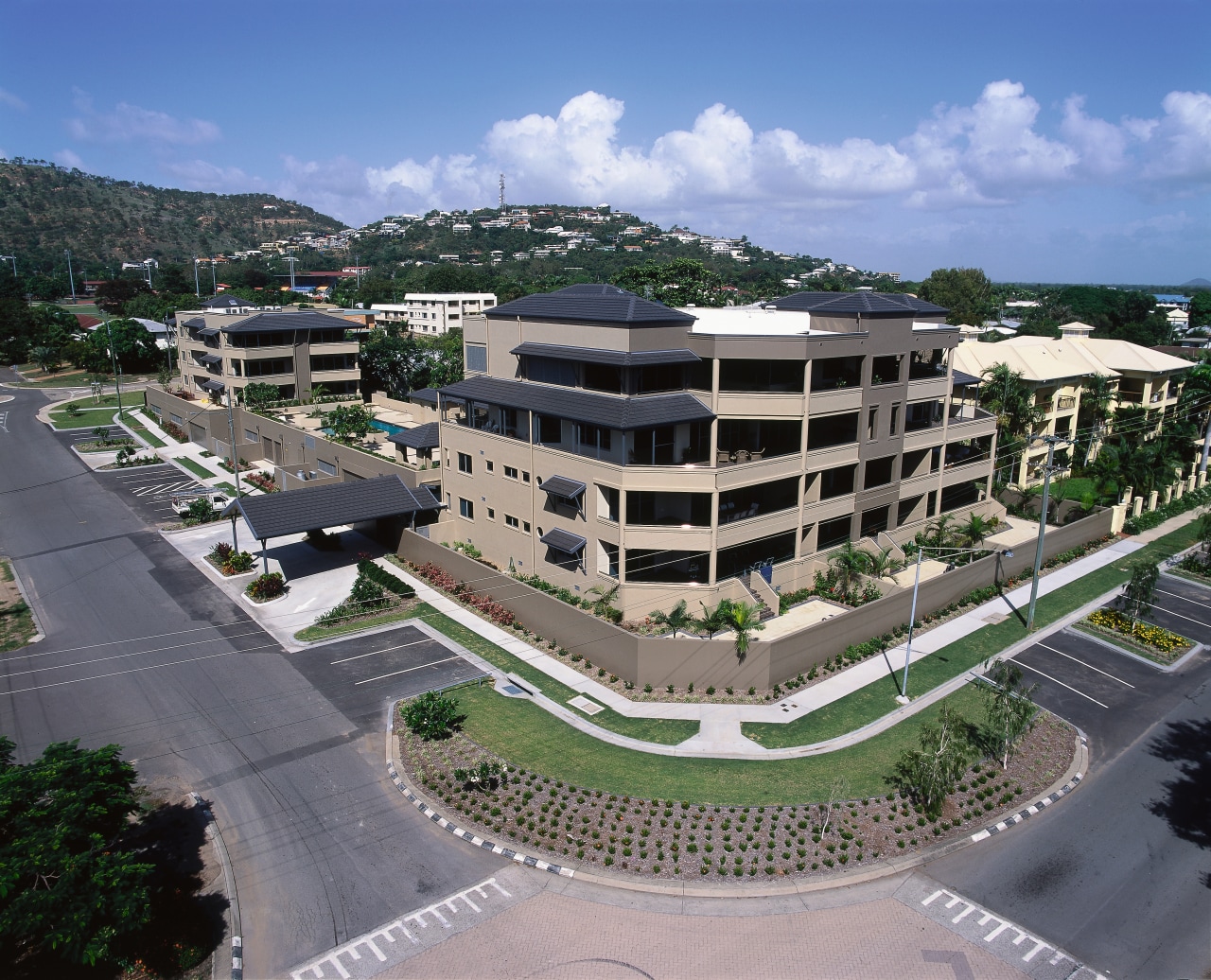 view of the large apartment block aerial photography, bird's eye view, building, city, condominium, corporate headquarters, estate, metropolitan area, mixed use, neighbourhood, real estate, residential area, suburb, urban design, gray