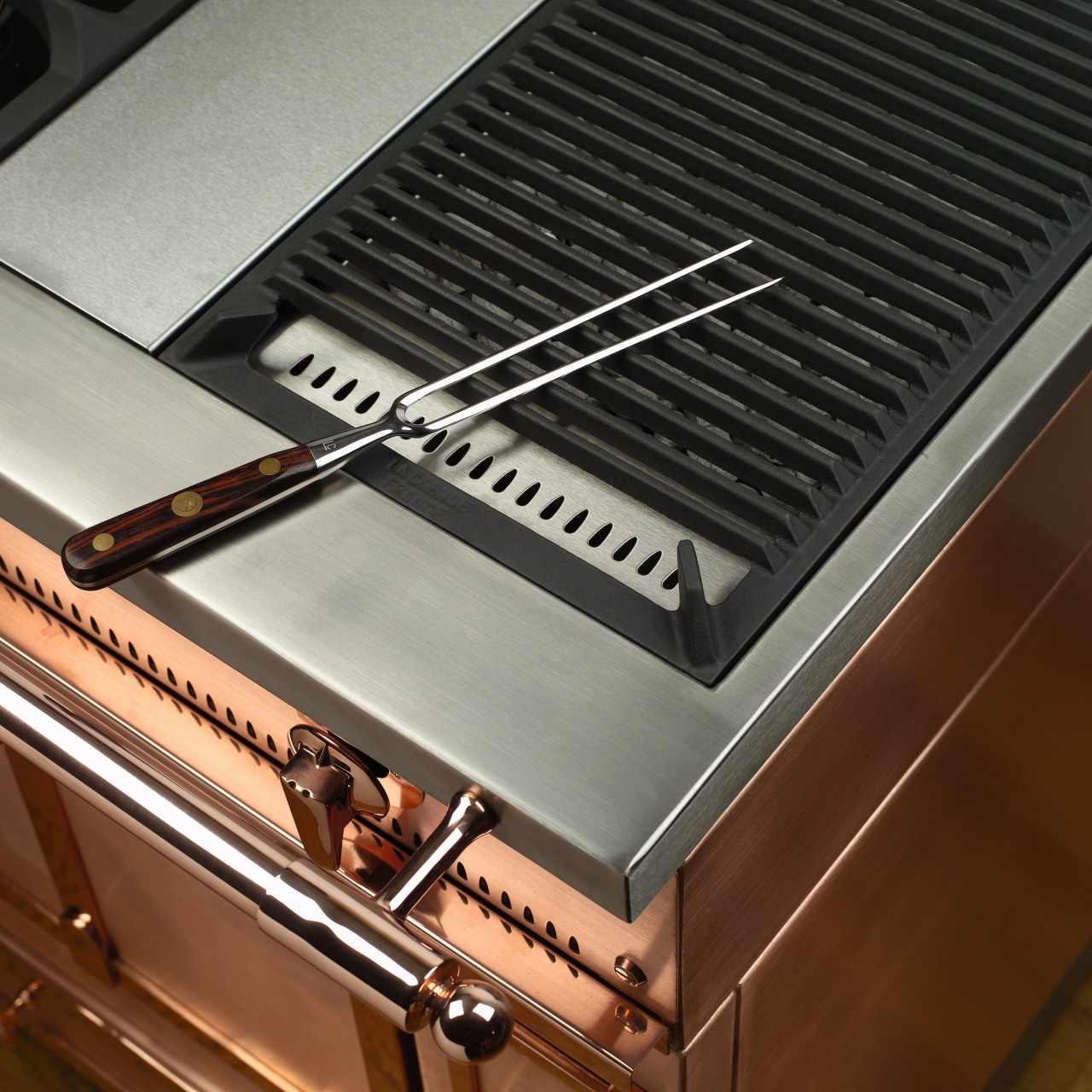 View of the BBQ stove top, copper oven, outdoor grill, brown, black, gray