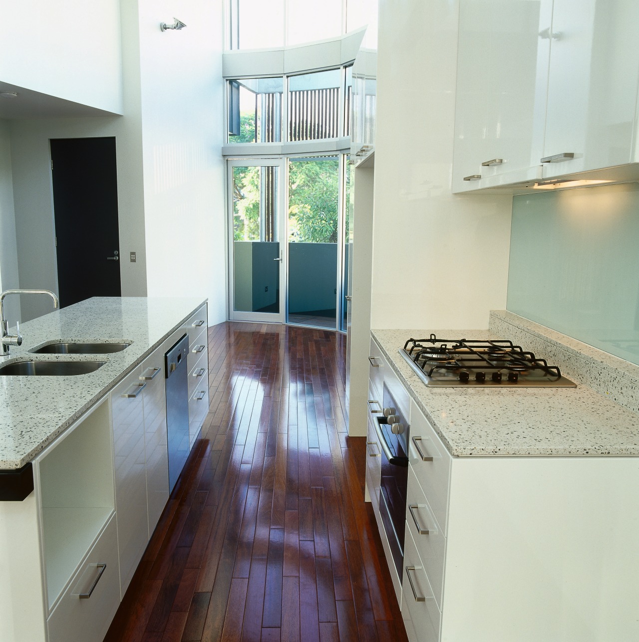 view of the kitchen and bosch appliances countertop, floor, flooring, hardwood, interior design, kitchen, property, real estate, room, white