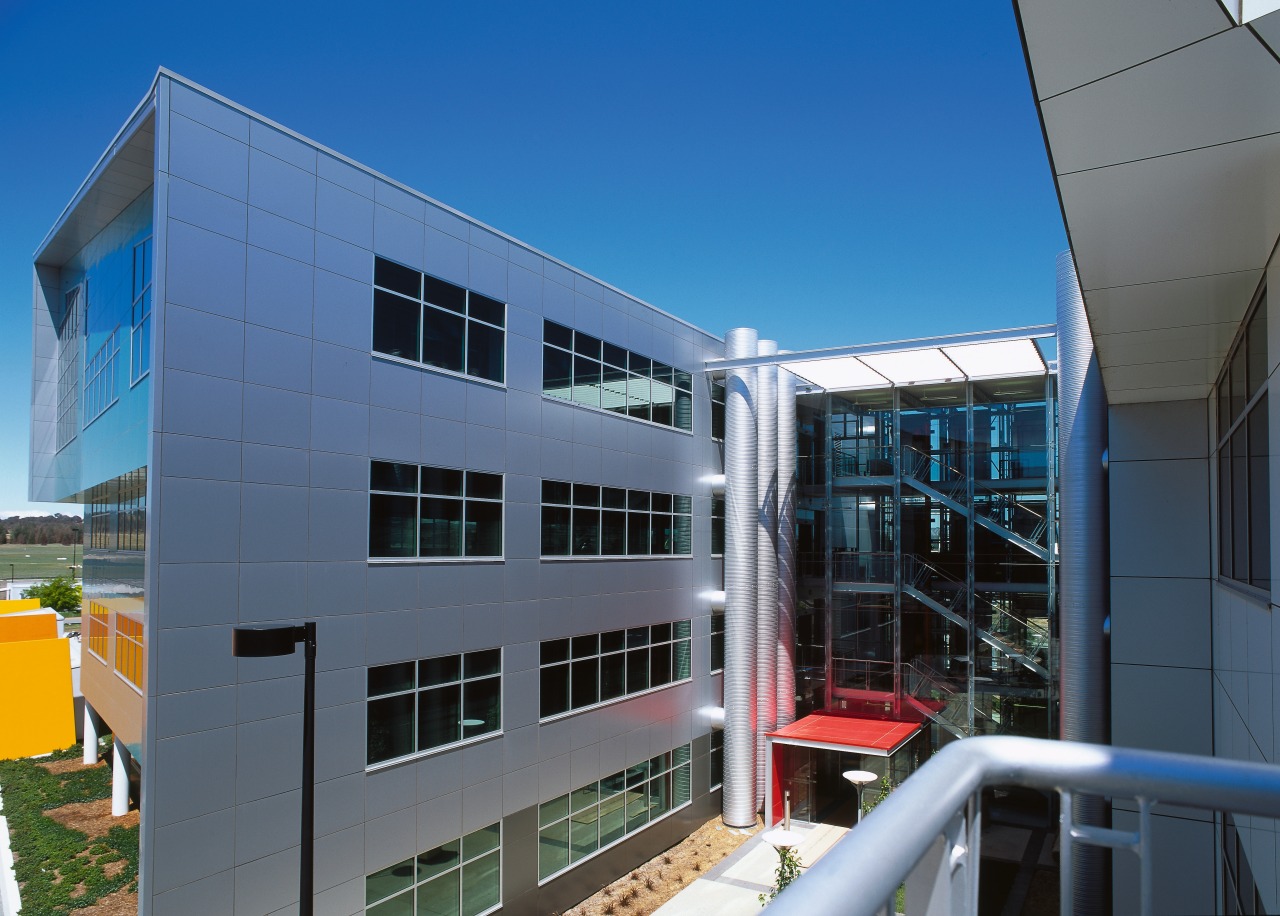 view of the metaliic exterior cladding architecture, building, corporate headquarters, facade, house, real estate, window, blue