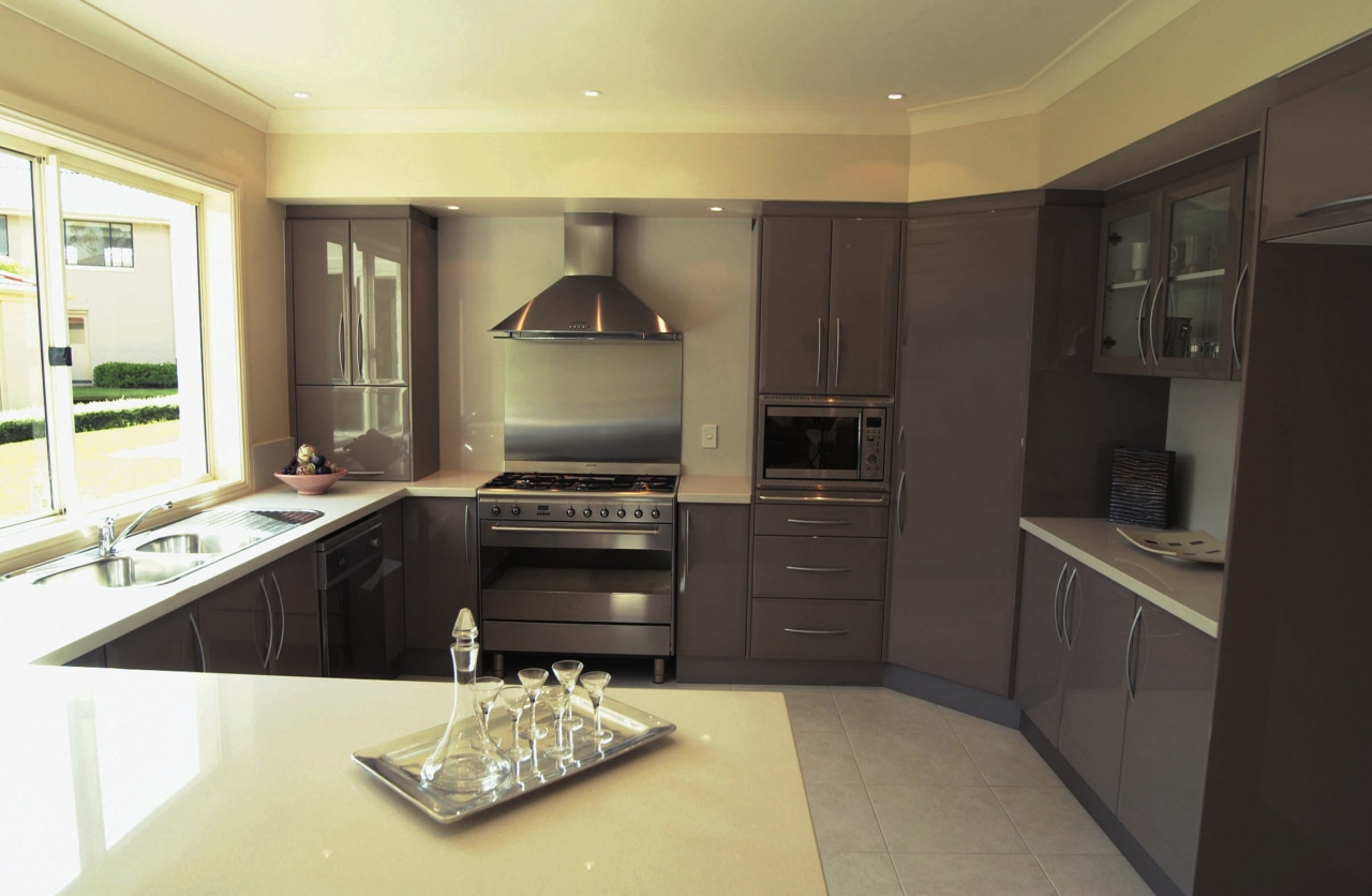 Kitchen with brown grey cabinetry, cream benchtop, stainless cabinetry, countertop, cuisine classique, interior design, kitchen, real estate, room, black