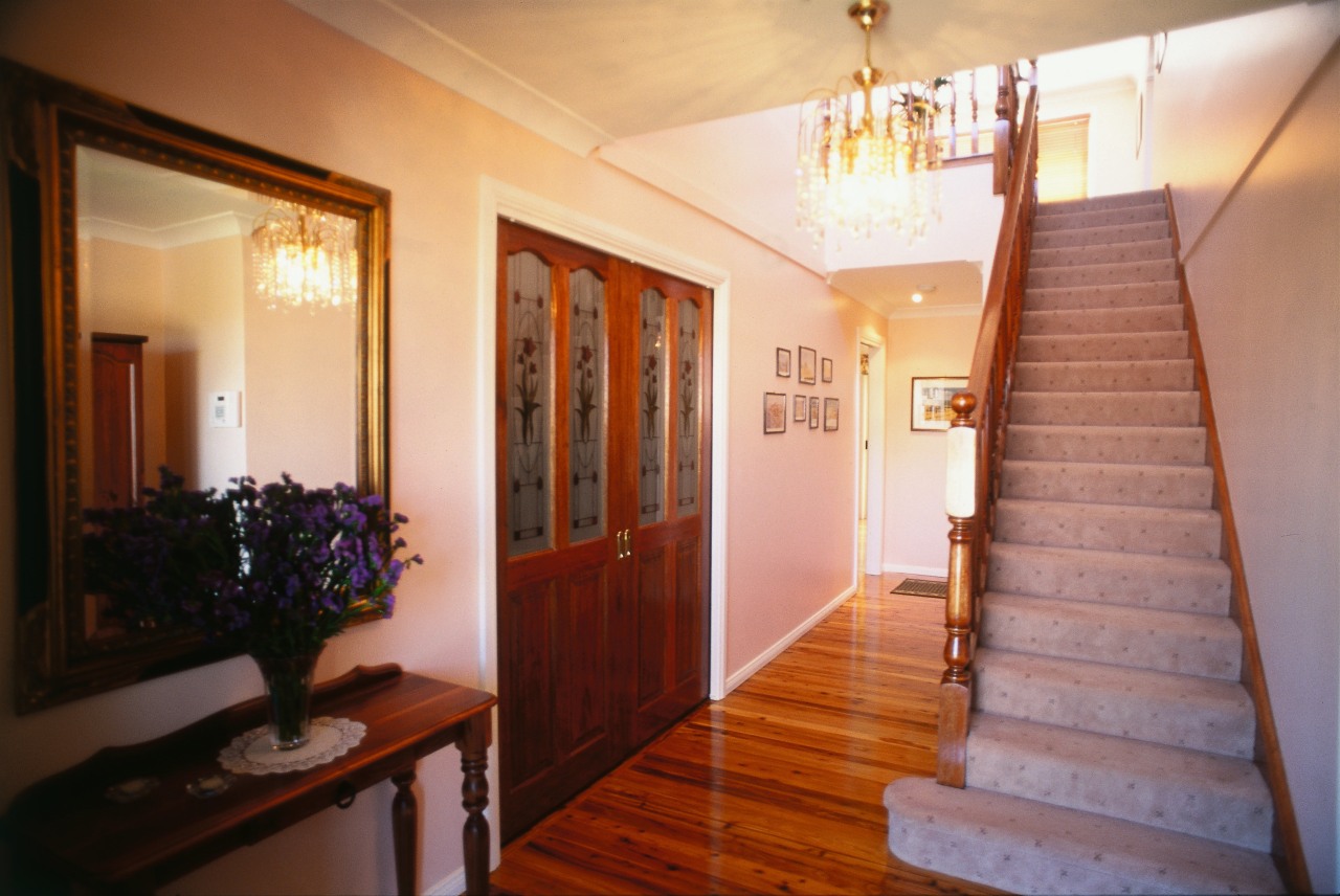 View of entranceway and hallway of house with apartment, ceiling, estate, floor, home, house, interior design, property, real estate, room, brown, orange