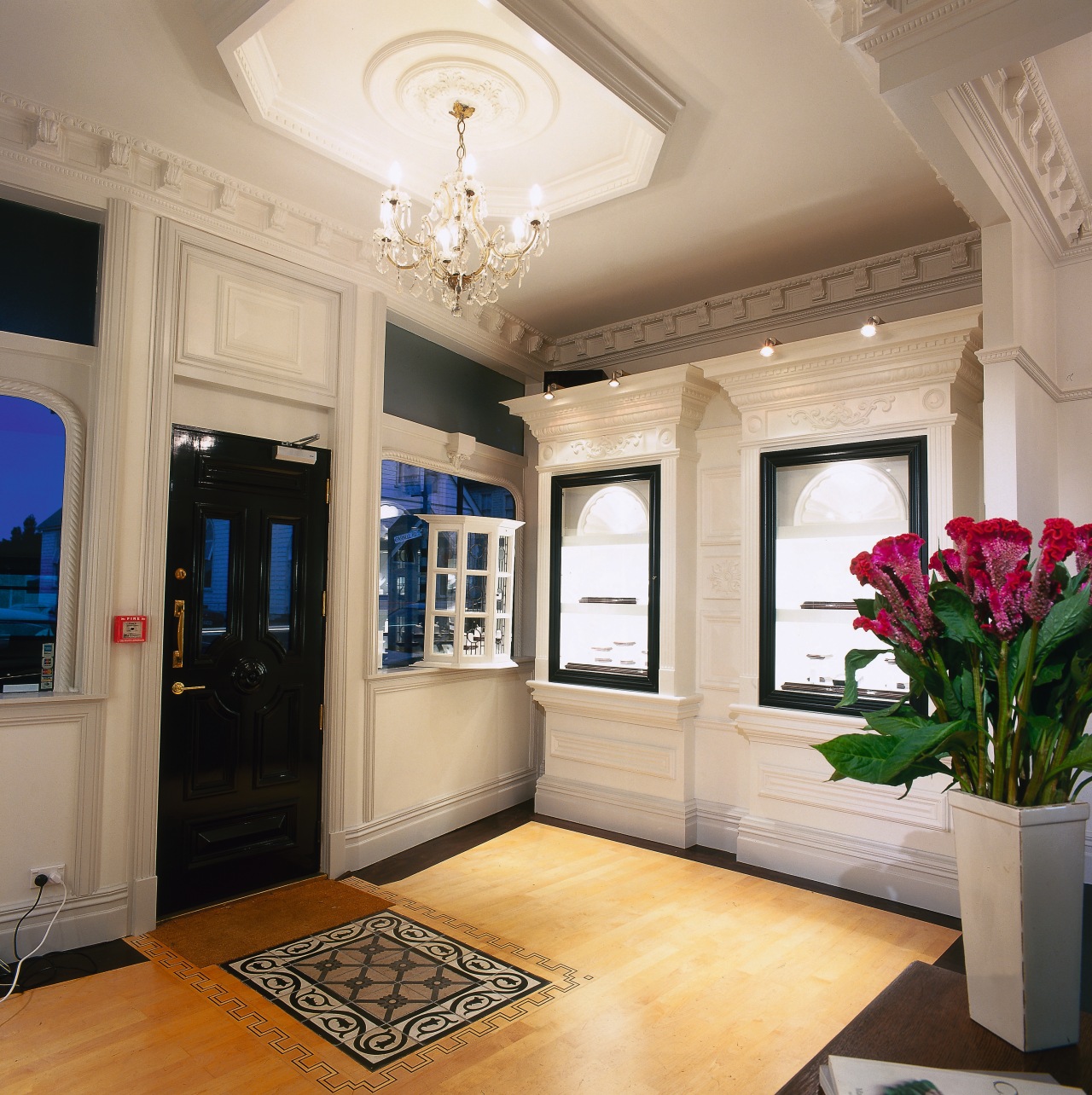 View of a jewllery showroom, wooden floor, rug, apartment, ceiling, estate, home, interior design, living room, real estate, room, window, gray