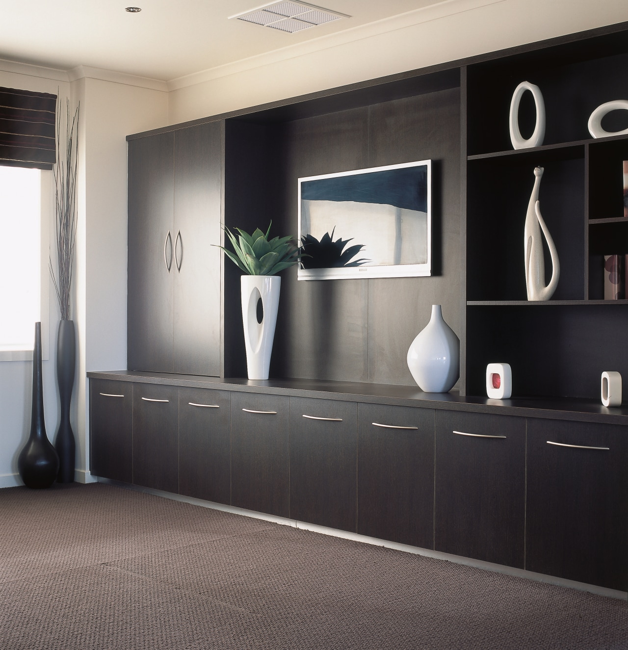 view of the custom unit wall cabinets flooring, furniture, interior design, shelving, gray, black