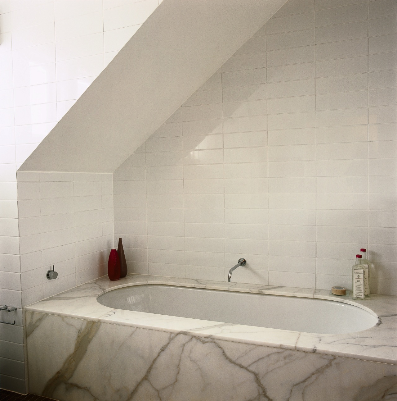 A view of the white bathtub, marble surround, architecture, bathroom, bathroom sink, bathtub, ceiling, daylighting, floor, interior design, plumbing fixture, product design, property, room, tap, tile, wall, gray