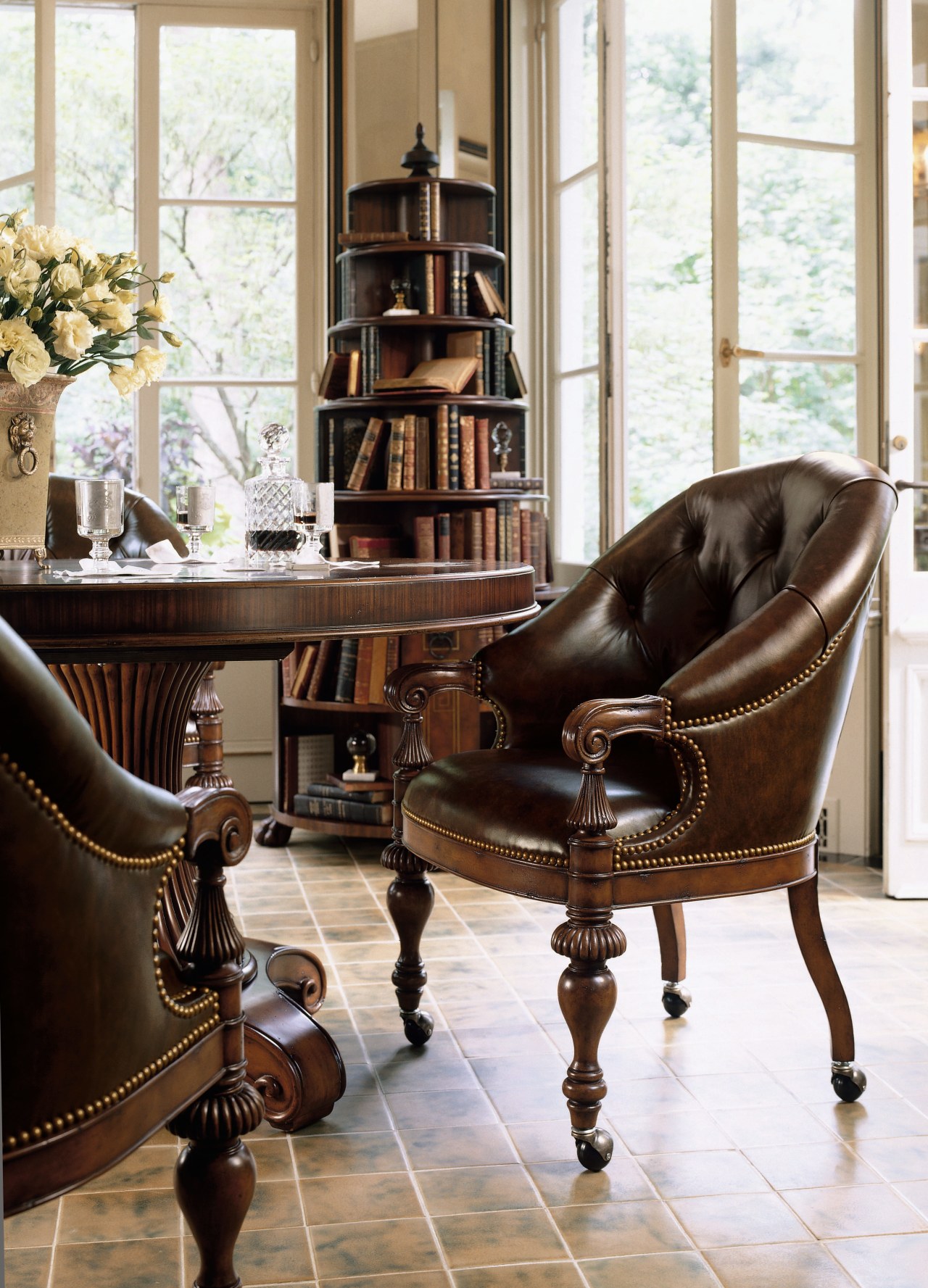 View of a library, tiled floor, large circular chair, floor, flooring, furniture, hardwood, home, interior design, living room, table, wood, white, brown
