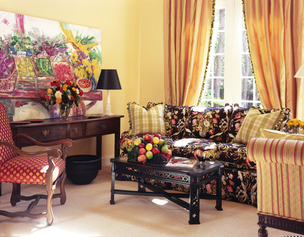 View of a living area, cream carpet, wooden furniture, home, interior design, living room, room, table, window, orange