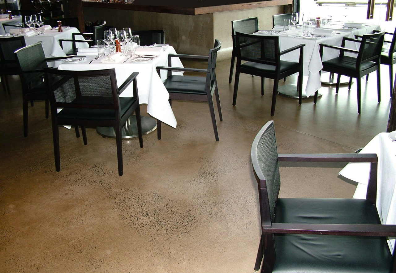 Restaurant dining room with polished concrete floor, dark chair, dining room, floor, flooring, furniture, hardwood, interior design, restaurant, table, tile, wood, wood flooring, black