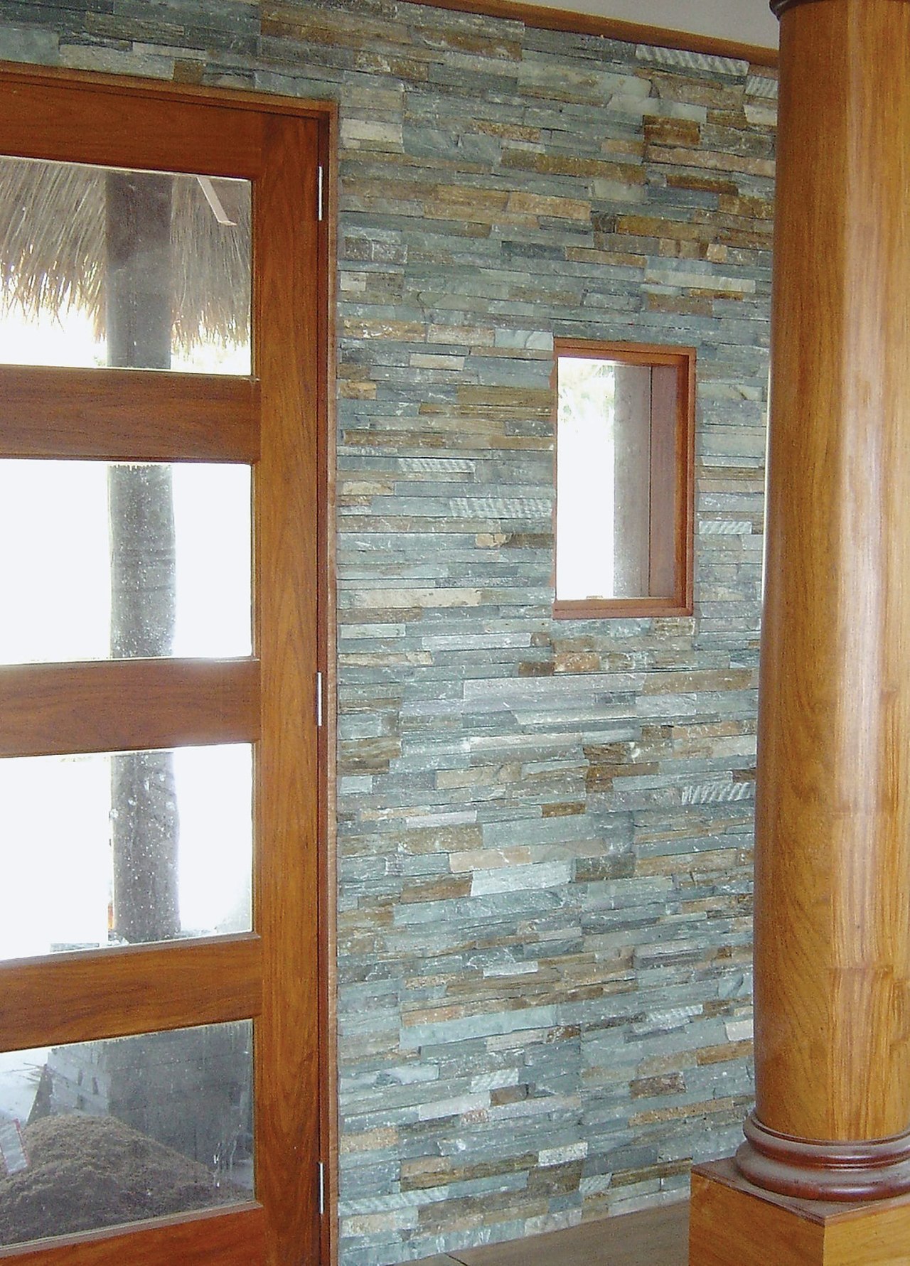 view of the homestone modulised natural stone walling door, floor, hardwood, wall, window, wood, wood stain, gray, brown