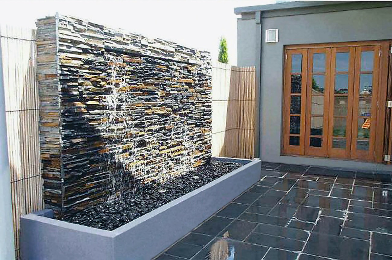 view of the this modulised natural stone  wall, window, gray