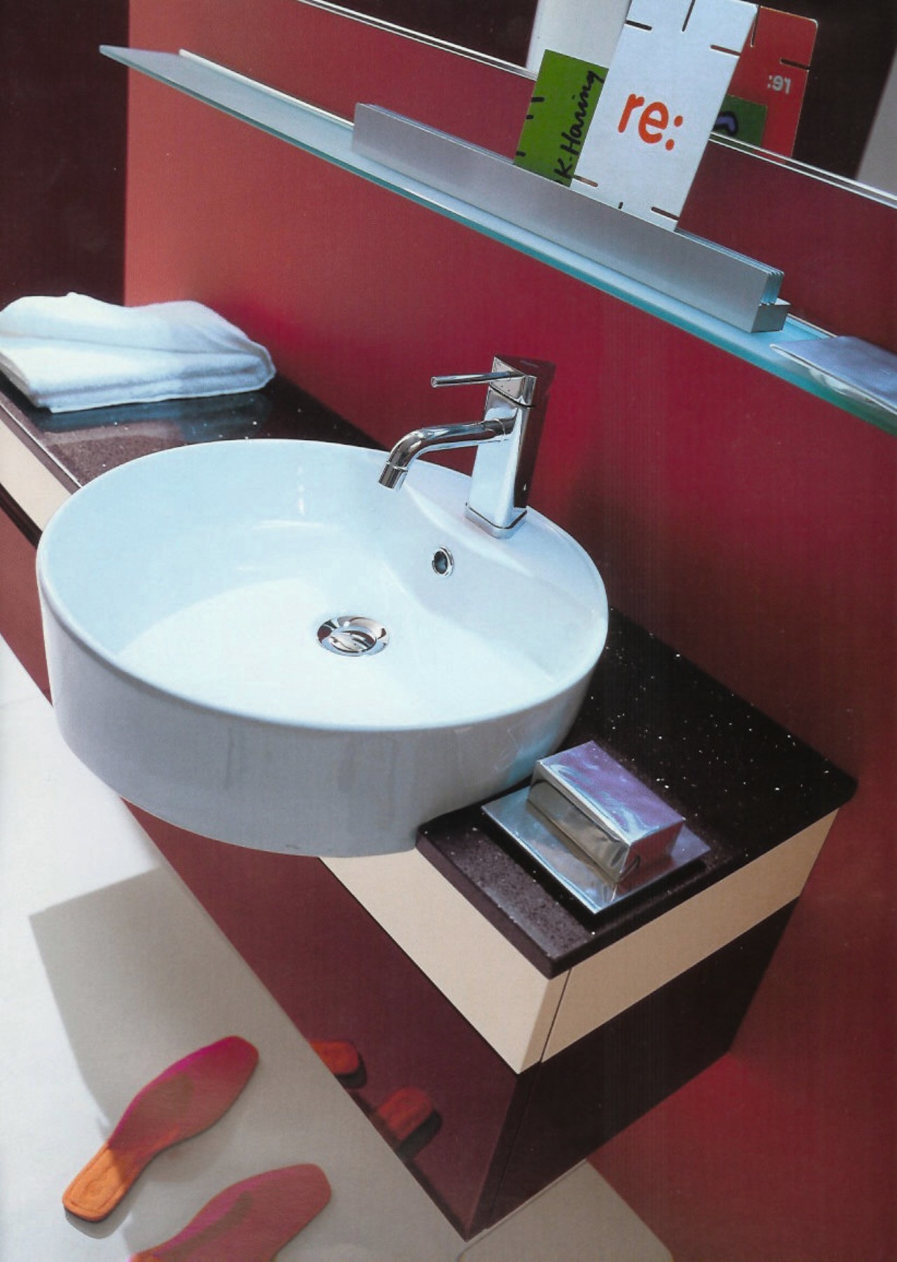 View of a ciecular with basin with chrome bathroom, bathroom cabinet, bathroom sink, ceramic, plumbing fixture, product, product design, sink, tap, red