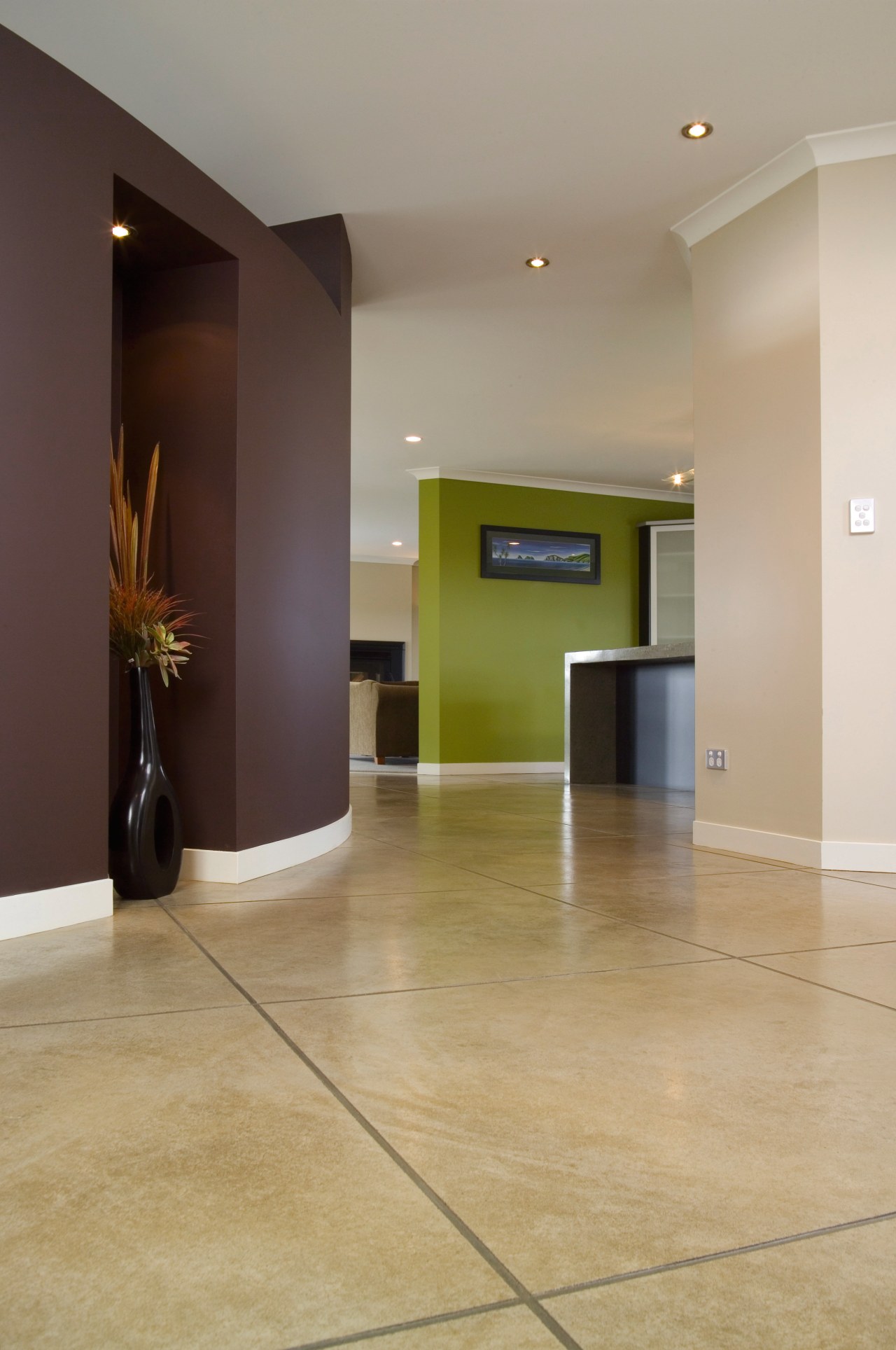 A view of a hallway, large cream concrete apartment, floor, flooring, hardwood, interior design, laminate flooring, lobby, real estate, tile, wood, wood flooring, gray, orange