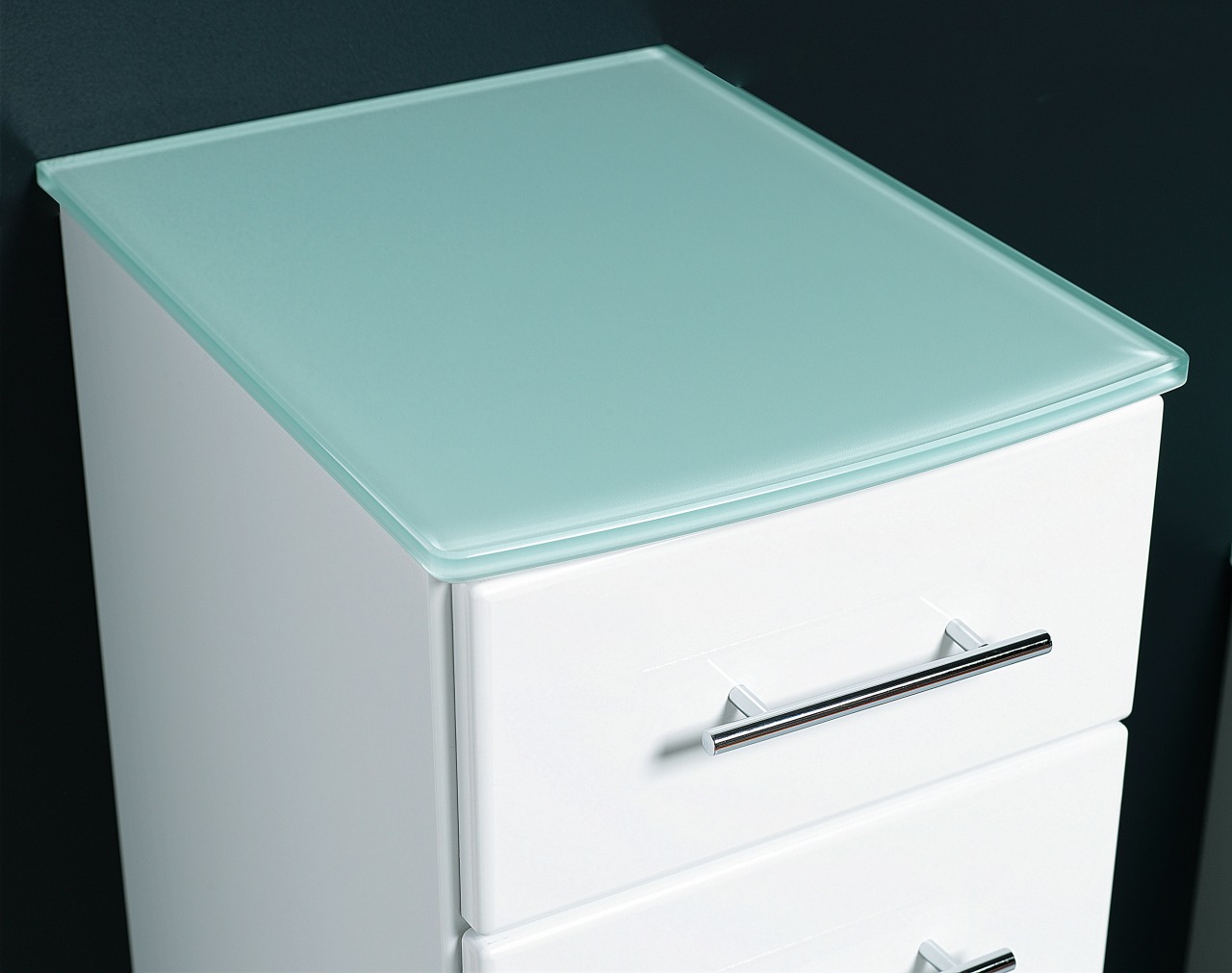 A close up view of a white draw chest of drawers, drawer, furniture, product design, gray, black